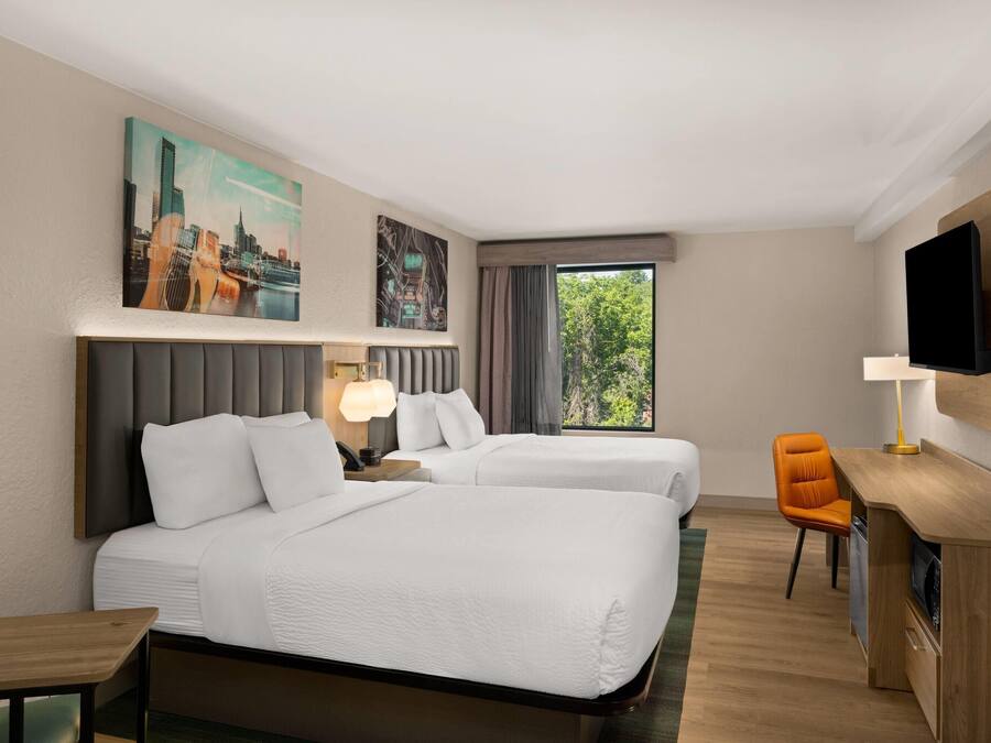 Deluxe Room, 2 Queen Beds, Non Smoking | Desk, soundproofing, iron/ironing board, free cots/infant beds