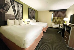 A hotel room with two beds, a desk, a chair, a TV, and a window with curtains. - Super 8 by Wyndham St Charles (St. Charles)