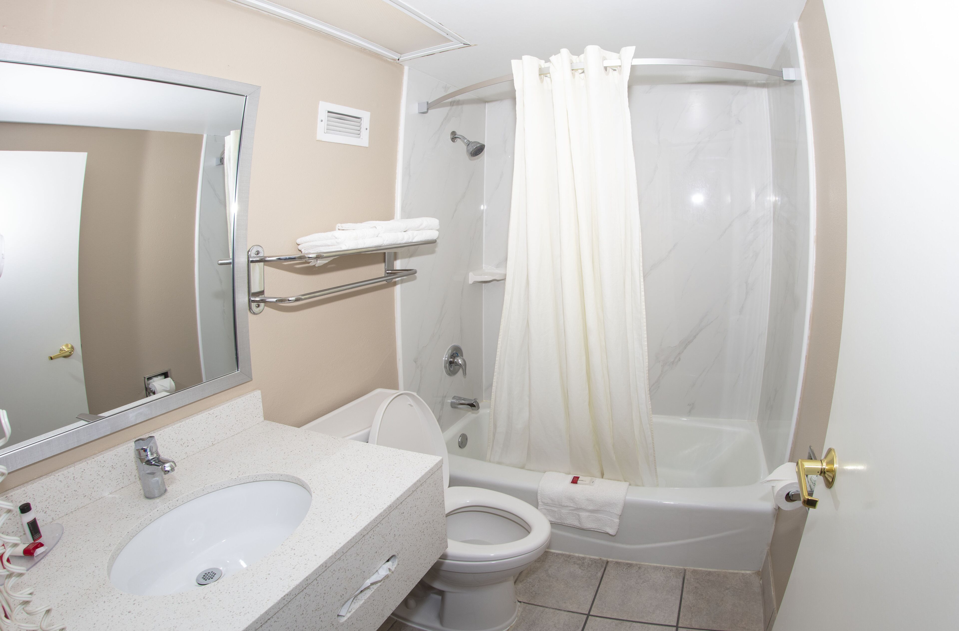 Combined shower/tub, eco-friendly toiletries, hair dryer, towels