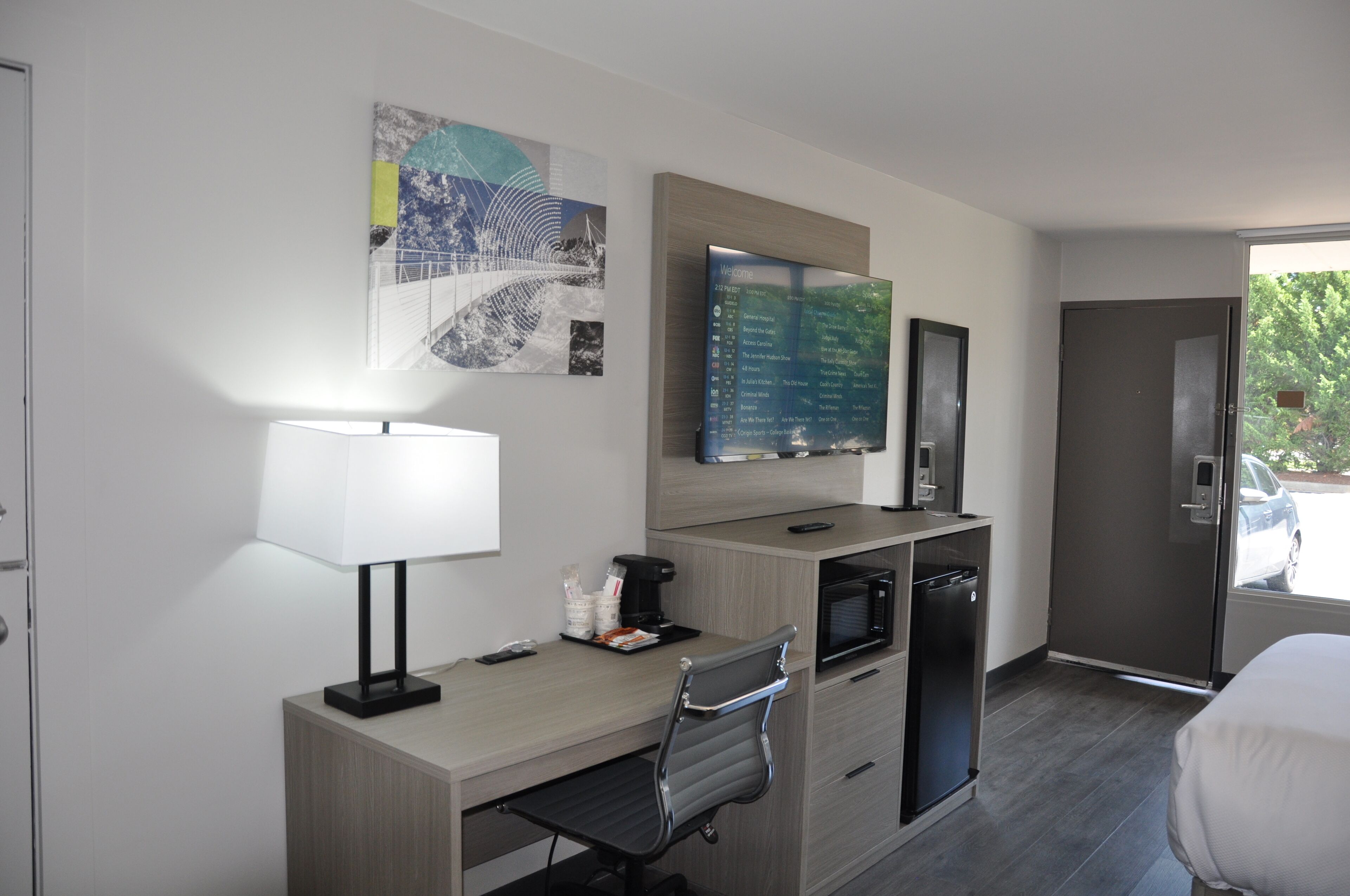 standard room, 2 queen beds, non smoking, refrigerator & microwave | living area | 32-inch flat-screen tv with satellite channels, tv