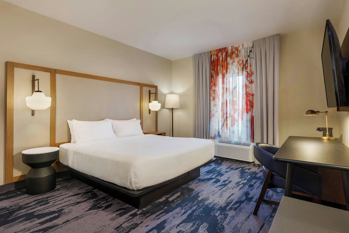Premium bedding, Tempur-Pedic beds, desk, laptop workspace