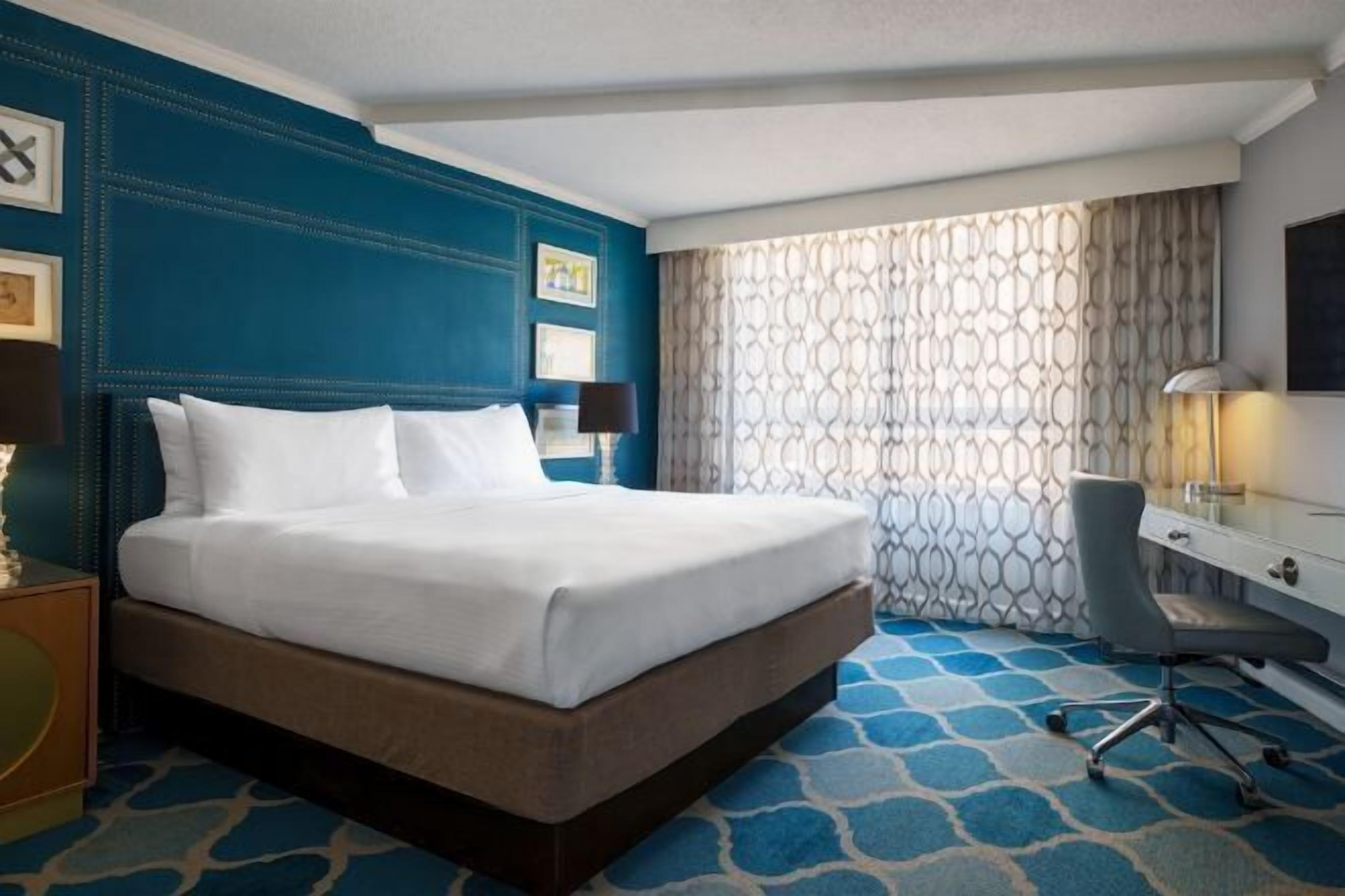 Premium bedding, down comforters, pillowtop beds, in-room safe