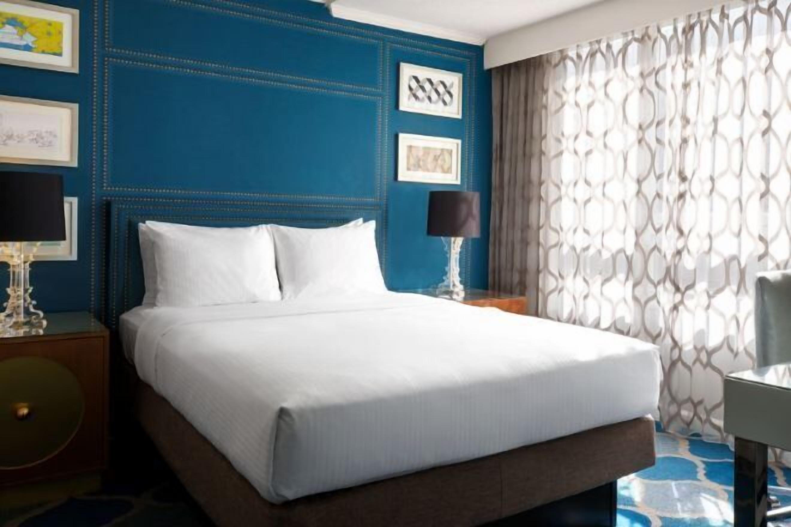 Premium bedding, down comforters, pillowtop beds, in-room safe