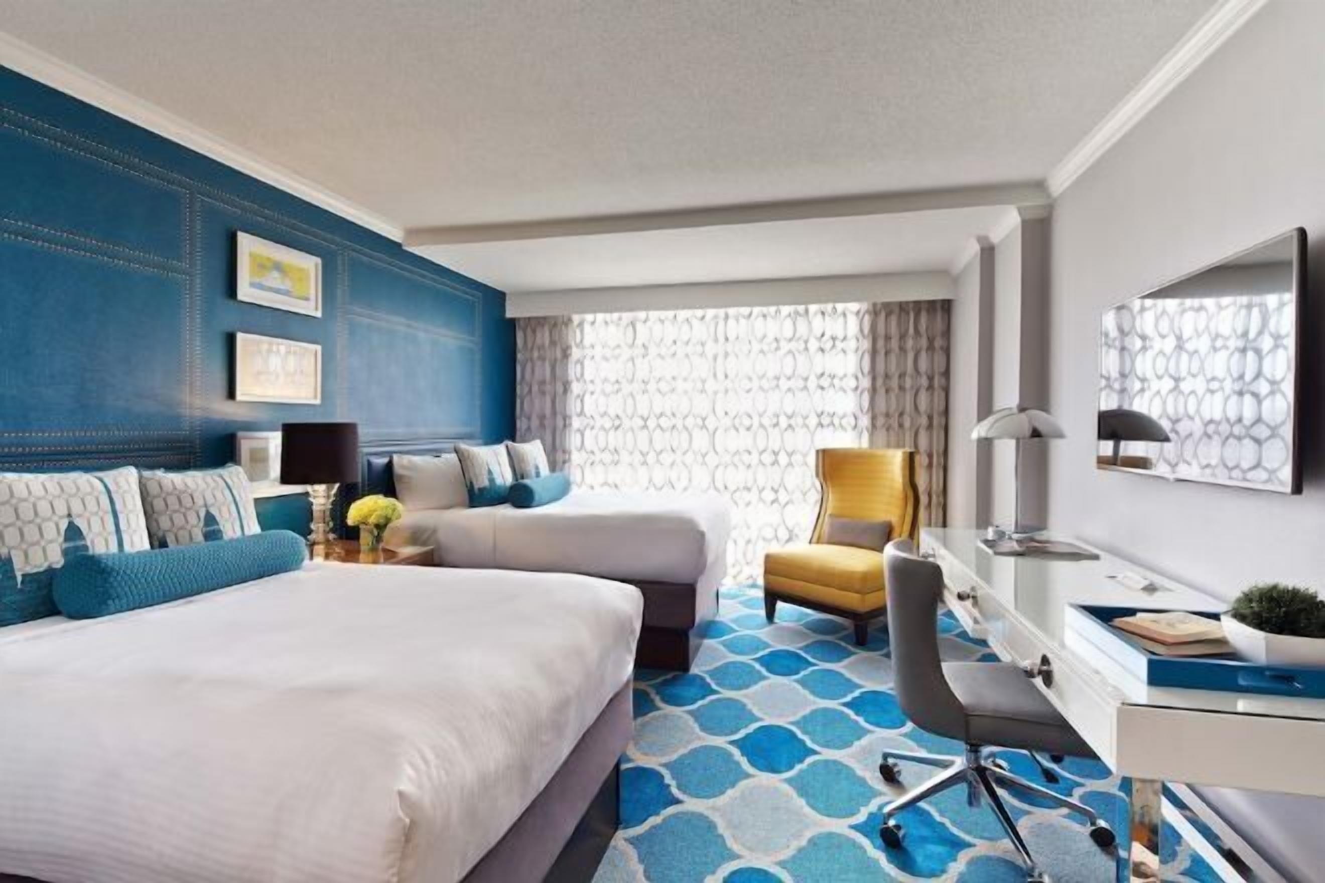 Premium bedding, down comforters, pillowtop beds, in-room safe