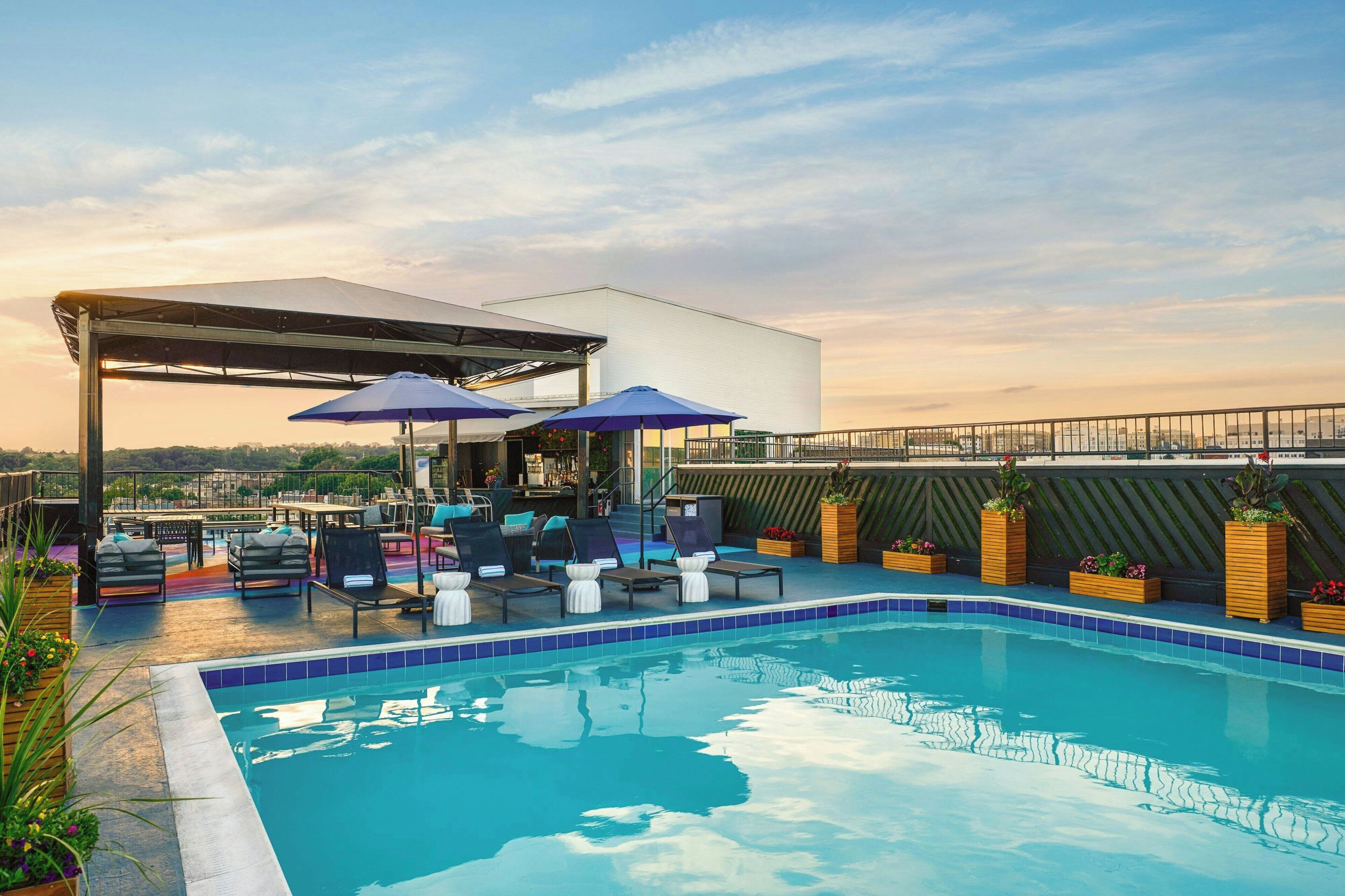 Seasonal outdoor pool, open 9:00 AM to 10:00 PM, sun loungers