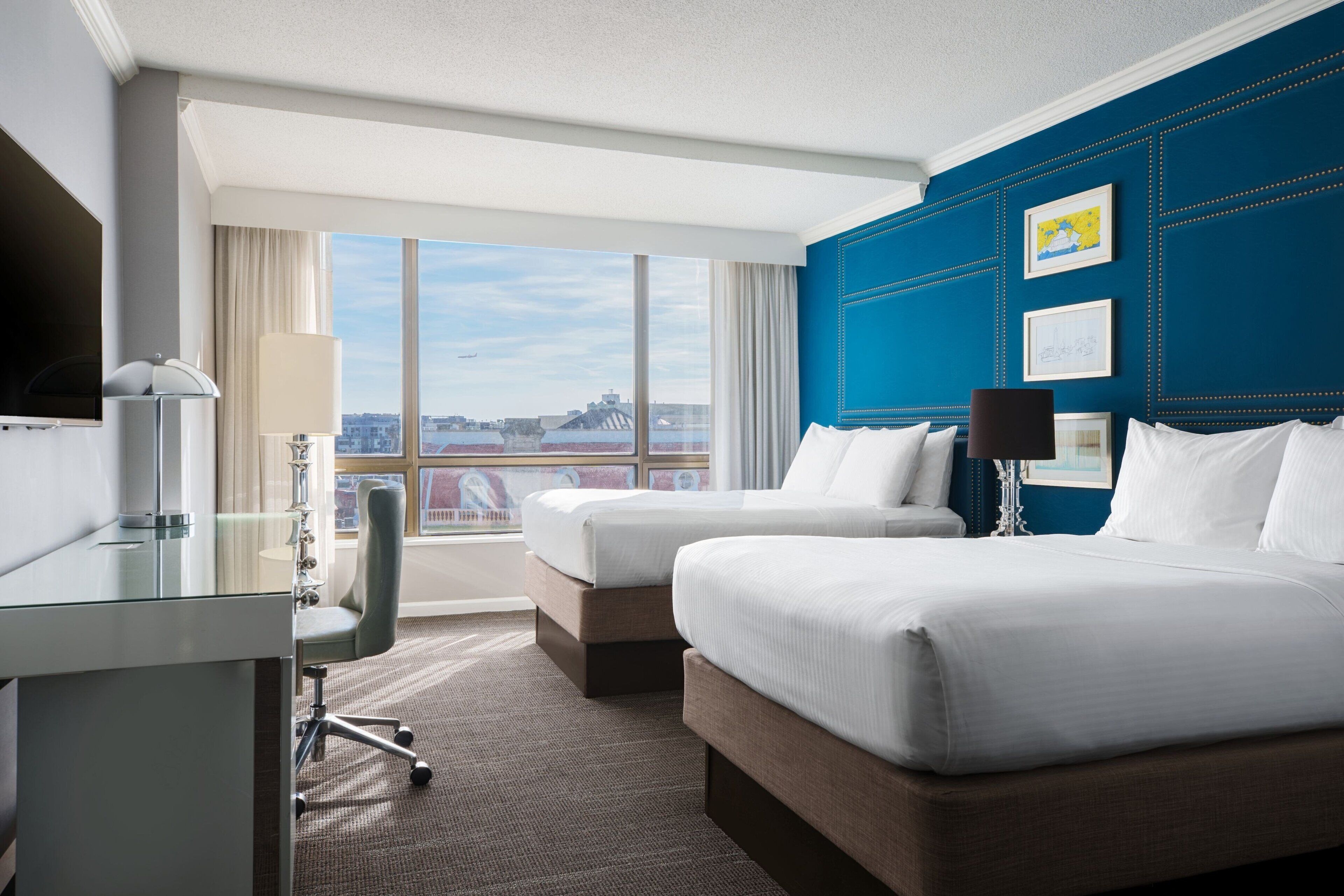 Premium bedding, down duvets, pillow-top beds, in-room safe