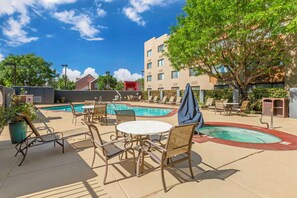 Outdoor pool, open 7 AM to 10 PM, pool umbrellas, pool loungers
