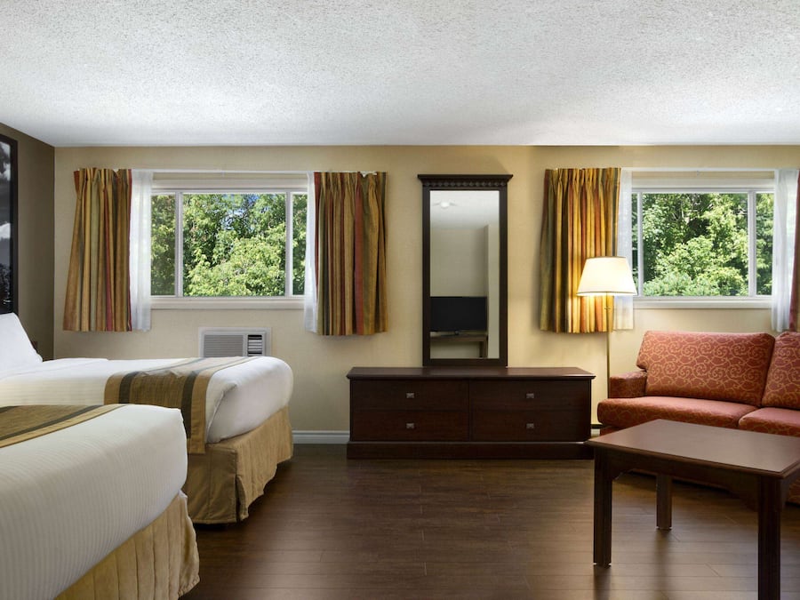 Down duvets, Select Comfort beds, individually decorated, desk