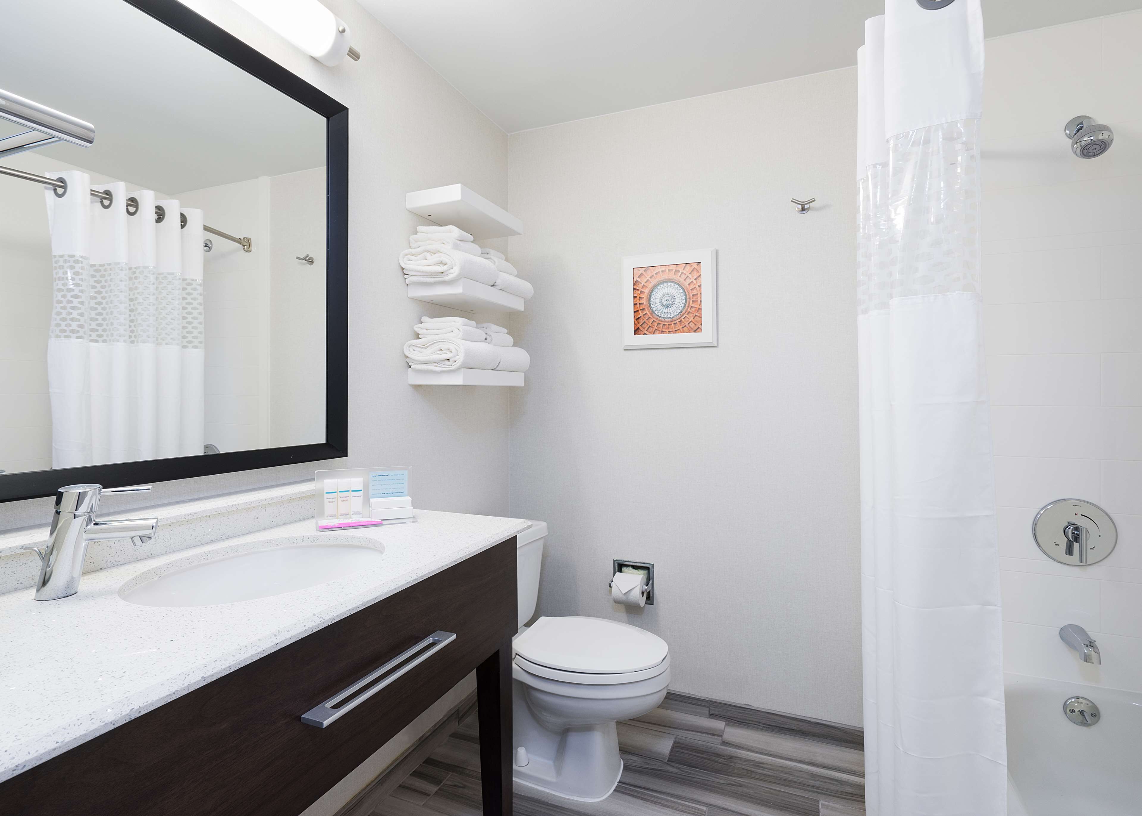 combined shower/bathtub, eco-friendly toiletries, hair dryer, towels