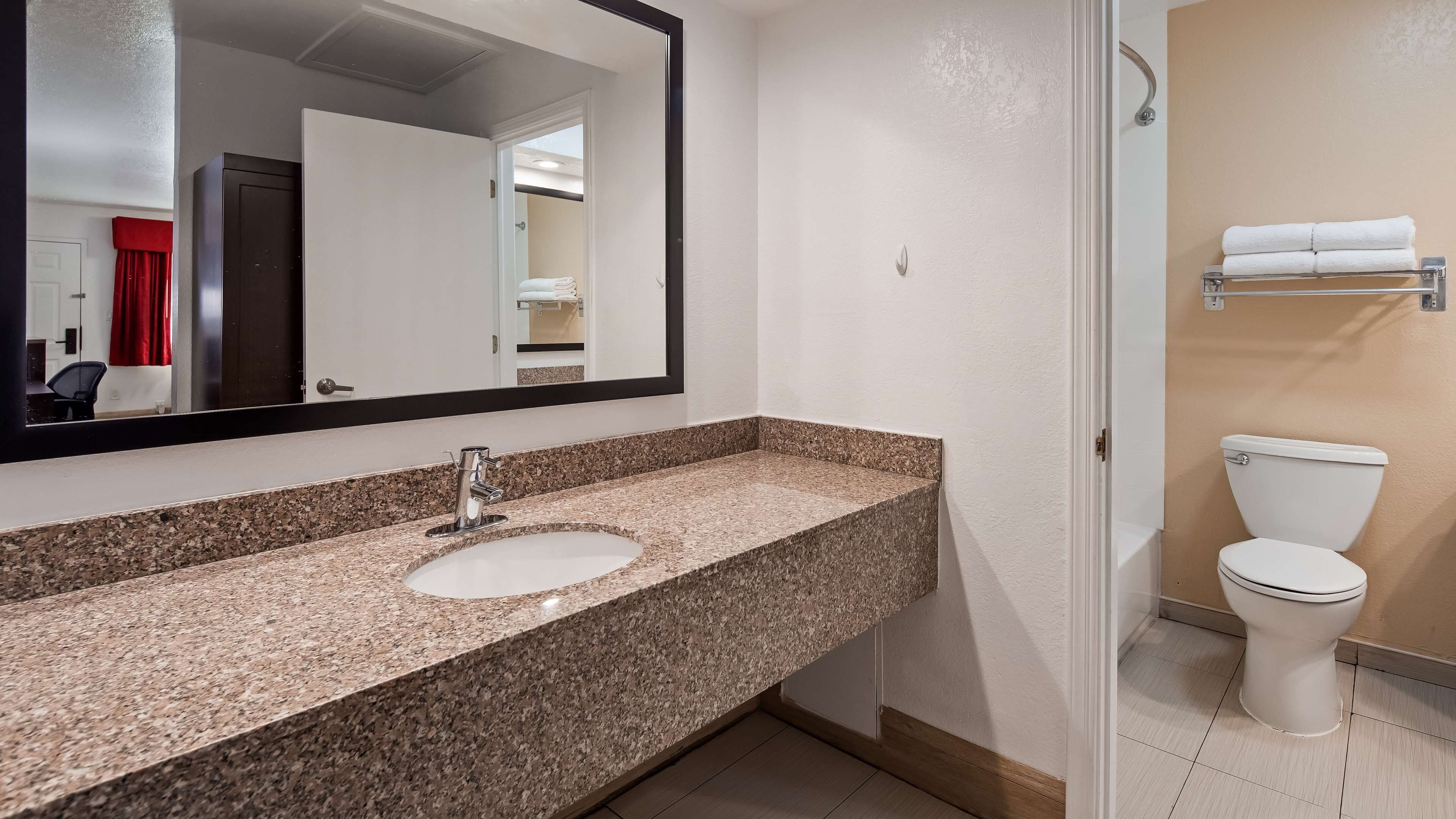 combined shower/bathtub, deep-soaking bathtub, eco-friendly toiletries