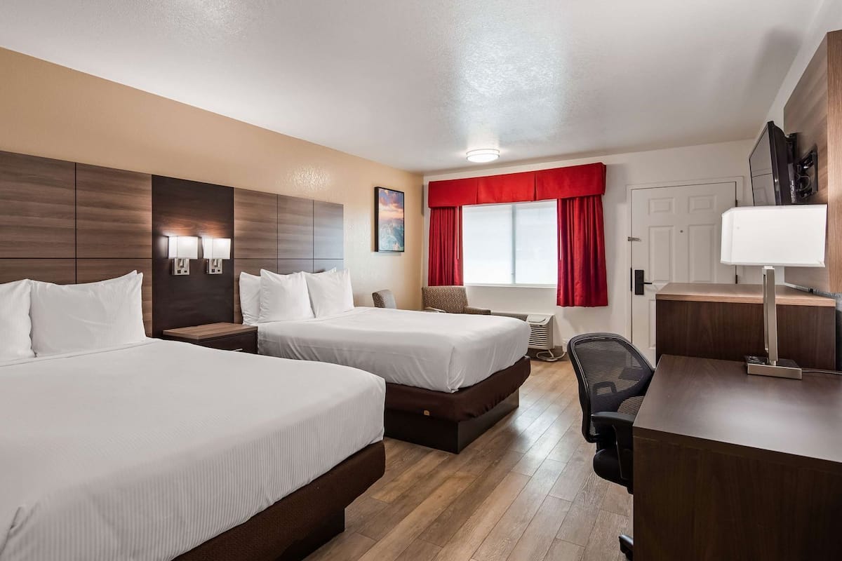 Premium bedding, pillowtop beds, desk, laptop workspace