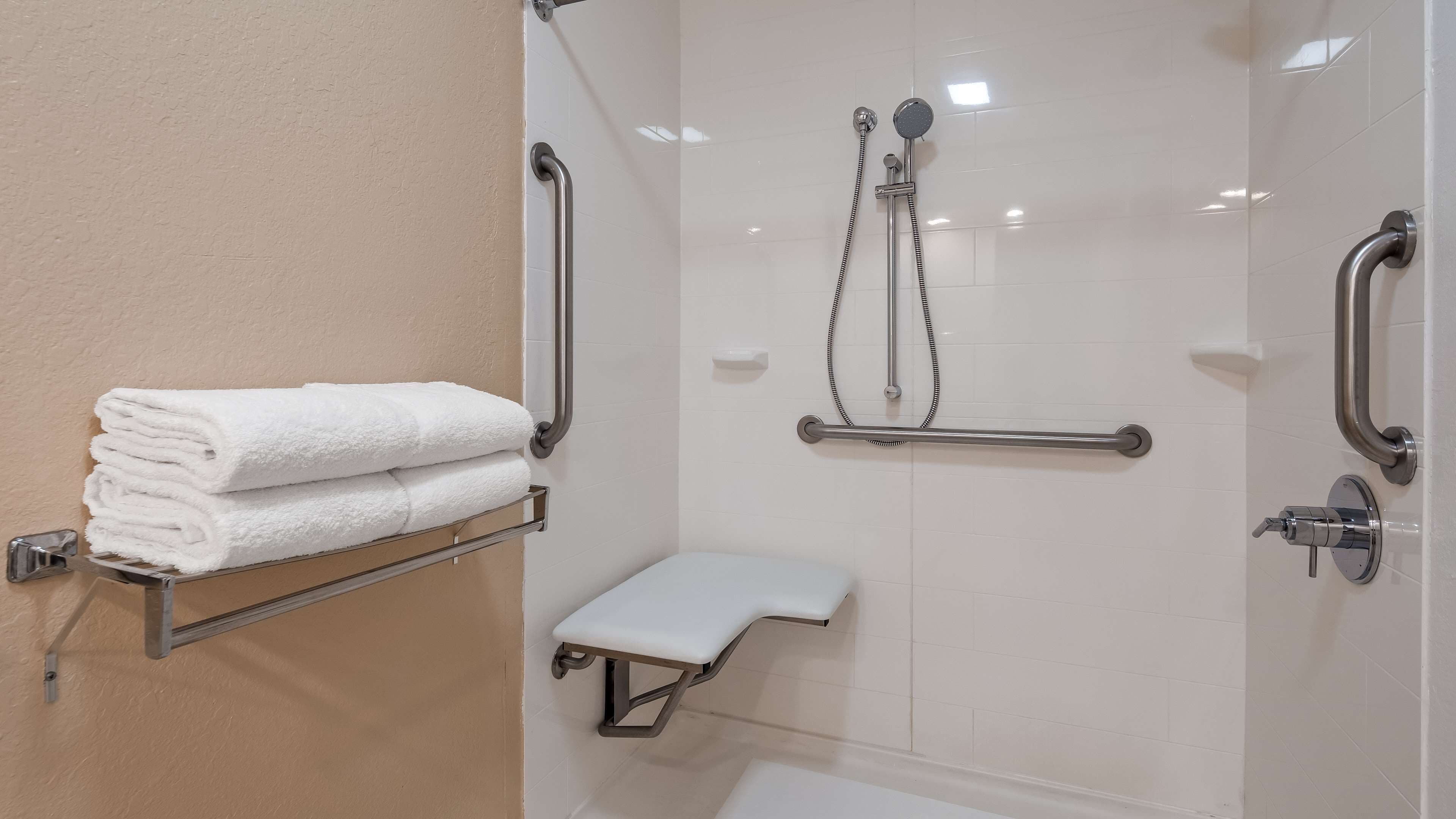 standard room, 2 queen beds, non smoking (pet friendly) | bathroom | combined shower/bathtub, deep-soaking bathtub, eco-friendly toiletries