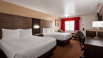 Premium bedding, pillowtop beds, desk, laptop workspace
