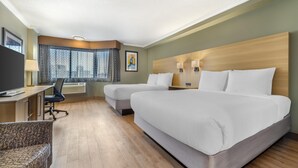 A hotel room with two beds, a desk, a chair, and a television. - Best Western Plus Ottawa City Centre (Ottawa)