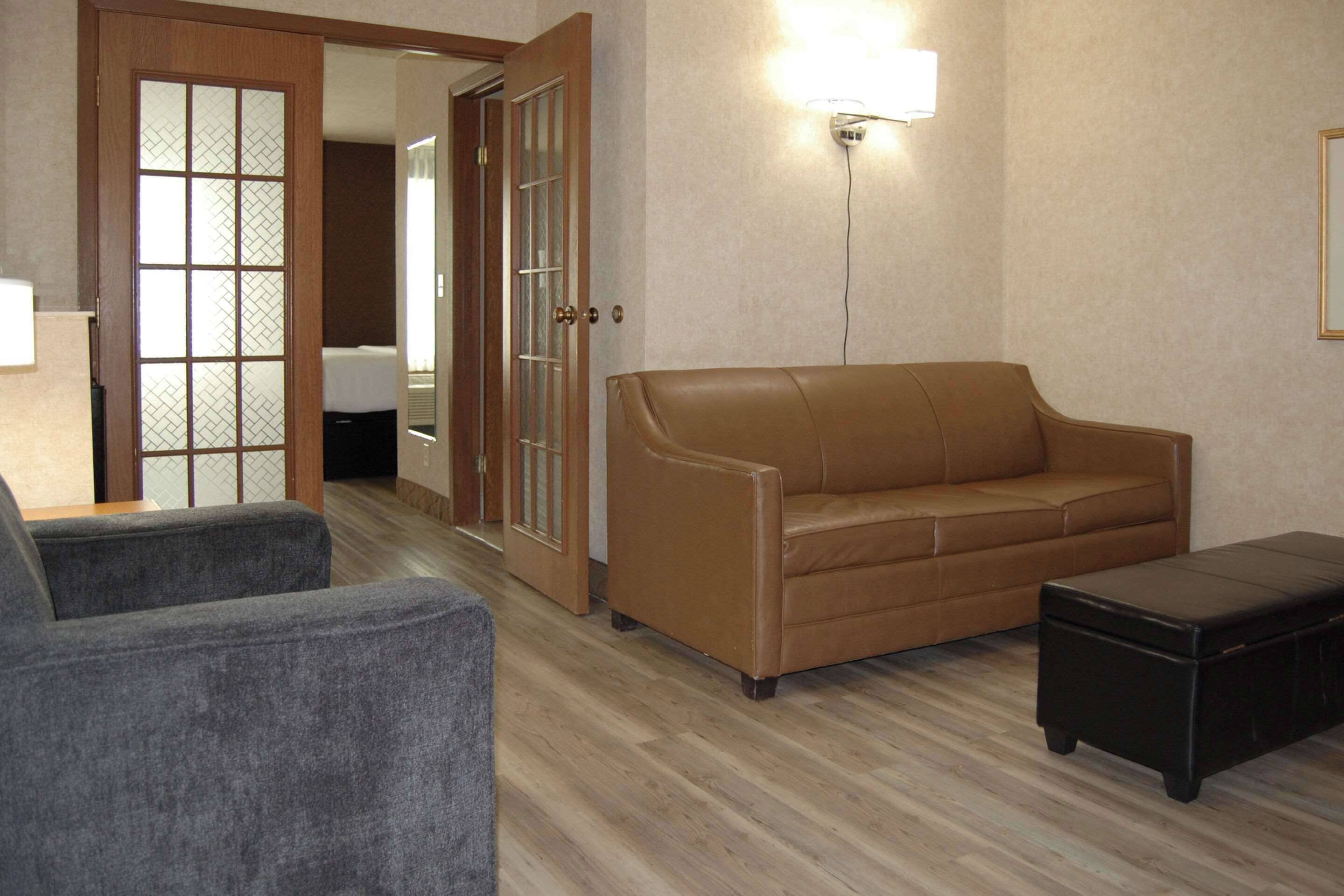 suite, 1 king bed with sofa bed, non smoking | in-room safe, desk, laptop workspace, iron/ironing board