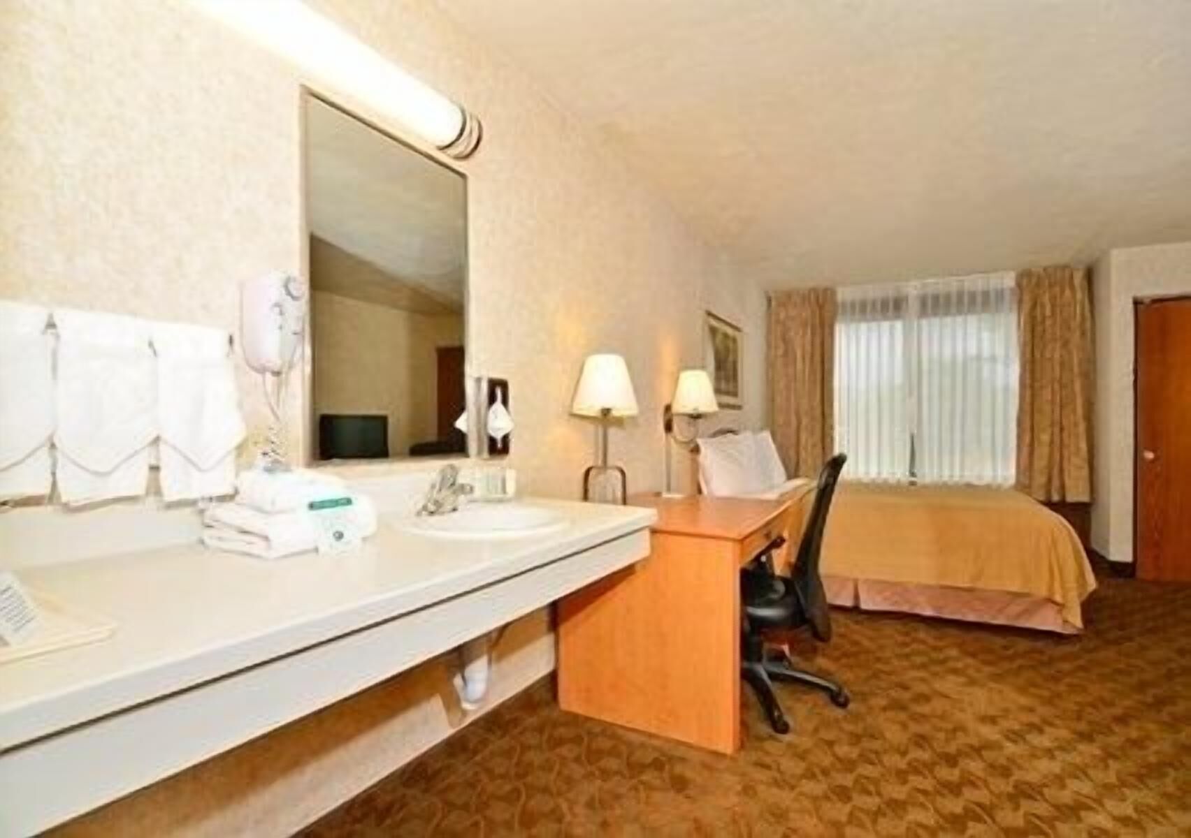 In-room safe, desk, laptop workspace, iron/ironing board