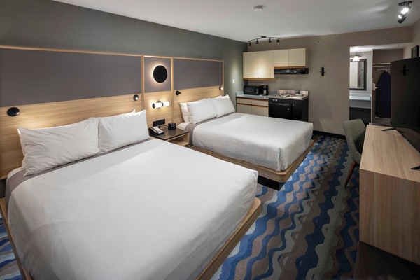 Pillow-top beds, desk, laptop workspace, blackout curtains