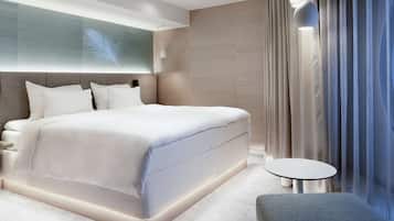 Suite junior | Ropa de cama de alta calidad, colchones viscoelásticos, minibar