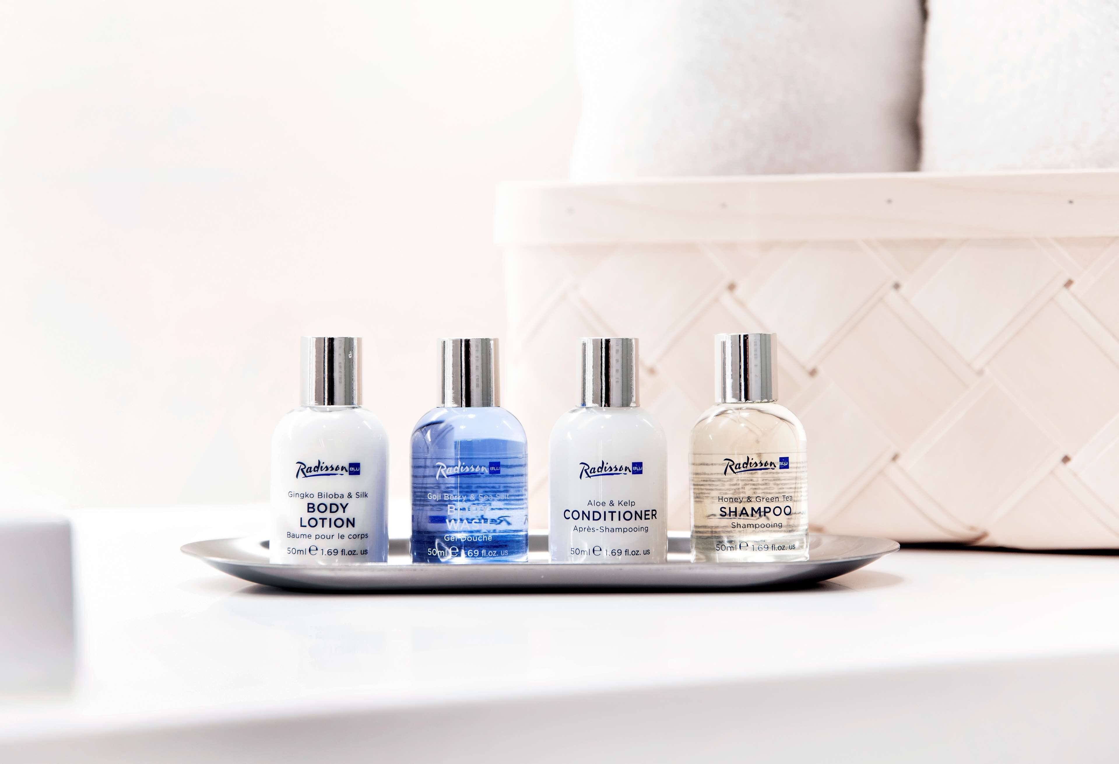 eco-friendly toiletries, hair dryer, towels