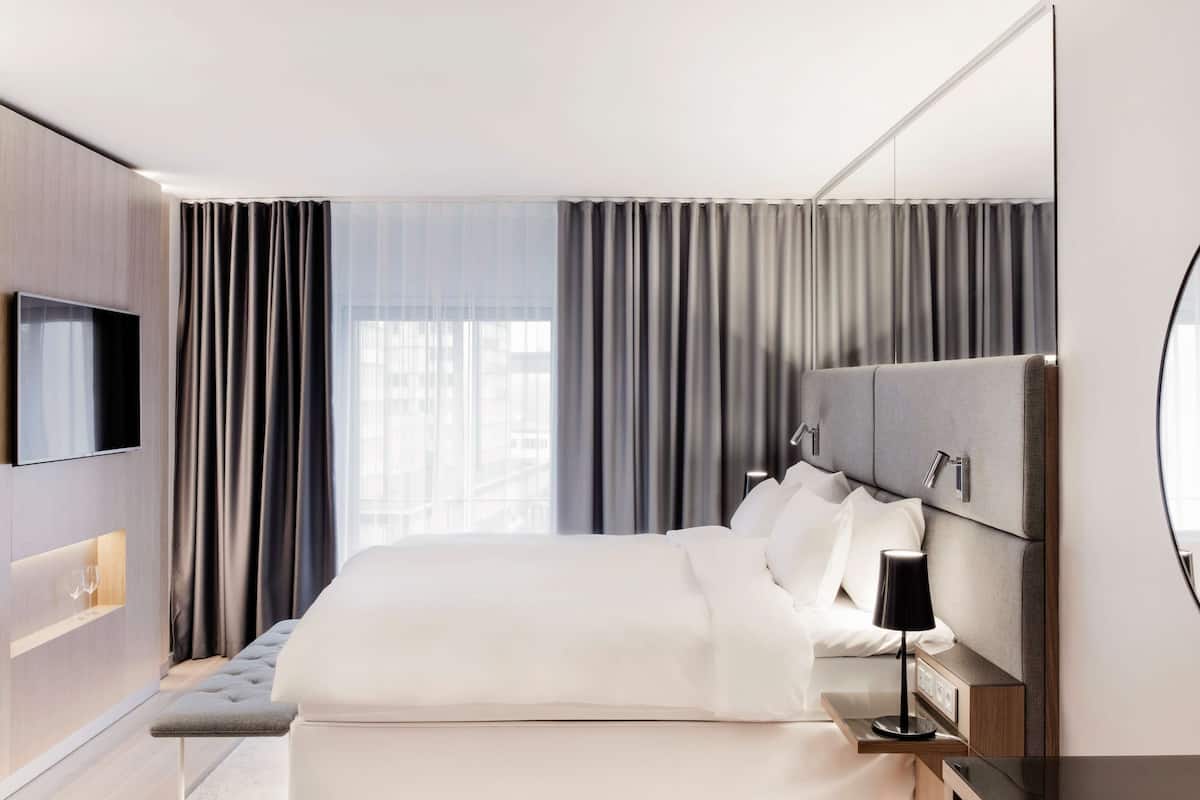 Premium bedding, memory-foam beds, minibar, in-room safe