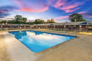 Seasonal outdoor pool, open 10:00 AM to 11 PM, sun loungers