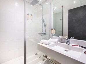 Eco-friendly toiletries, hair dryer, towels