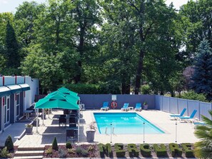 Seasonal outdoor pool, open 9 AM to 8 PM, pool loungers