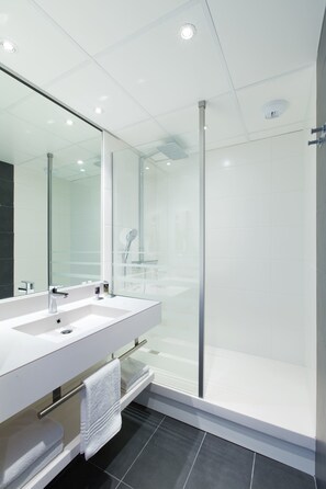 Eco-friendly toiletries, hair dryer, towels