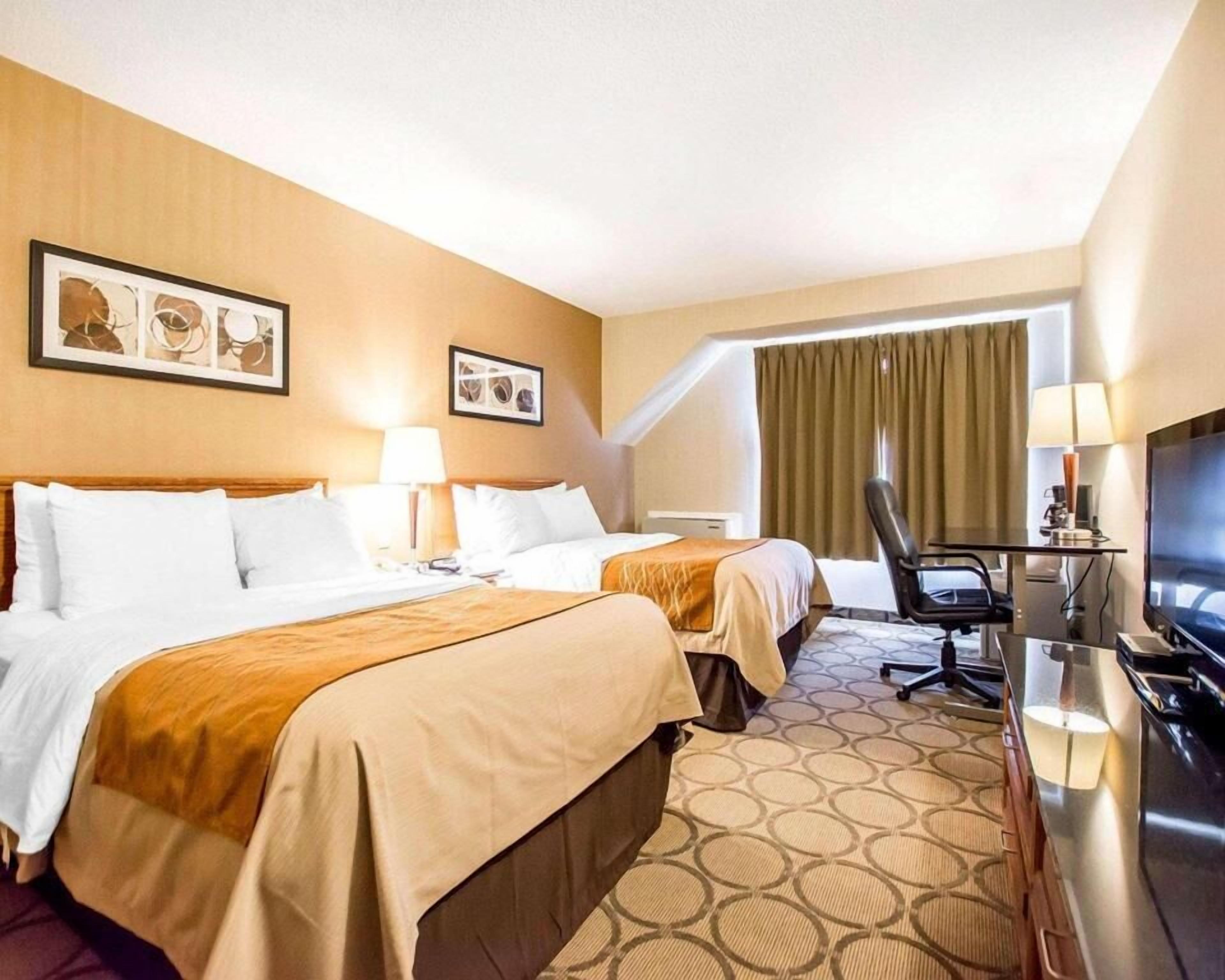 Premium bedding, pillowtop beds, desk, blackout drapes