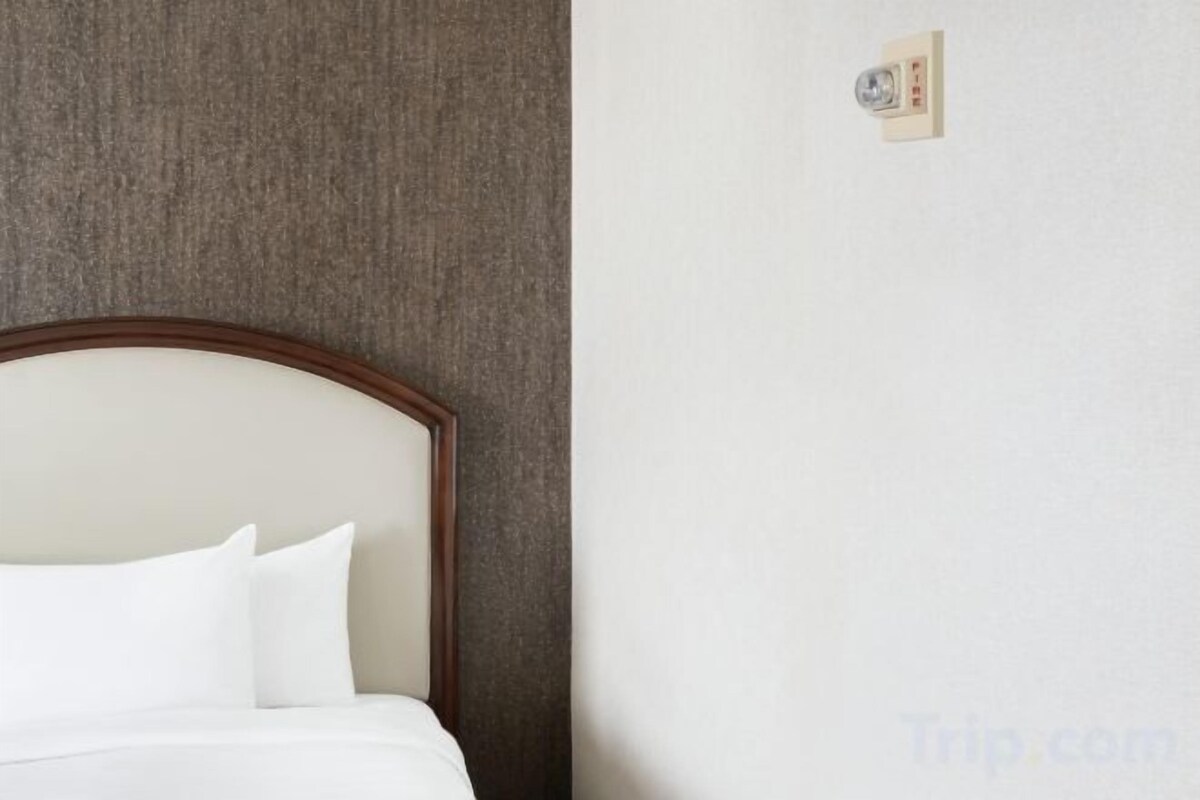 Luxe beddengoed, pillowtop-bedden, een kluis op de kamer, een bureau