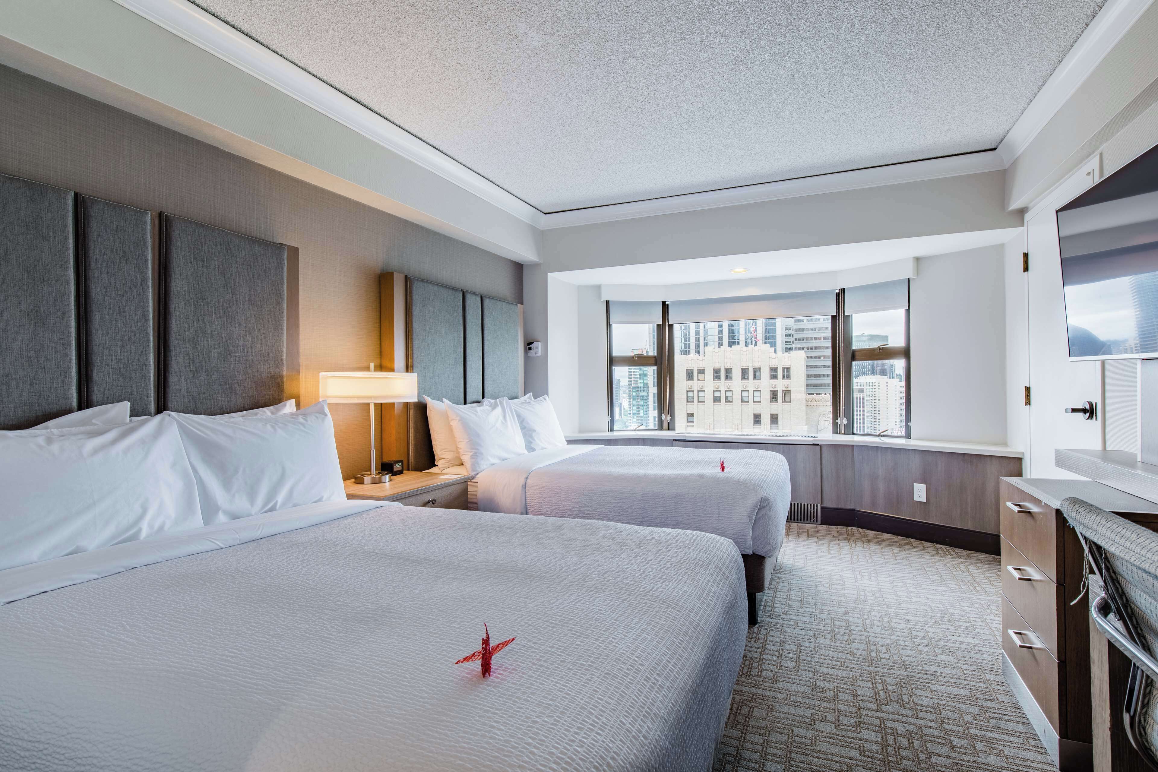 room, 2 double beds, club lounge access, city view | in-room safe, blackout curtains, free cots/infant beds