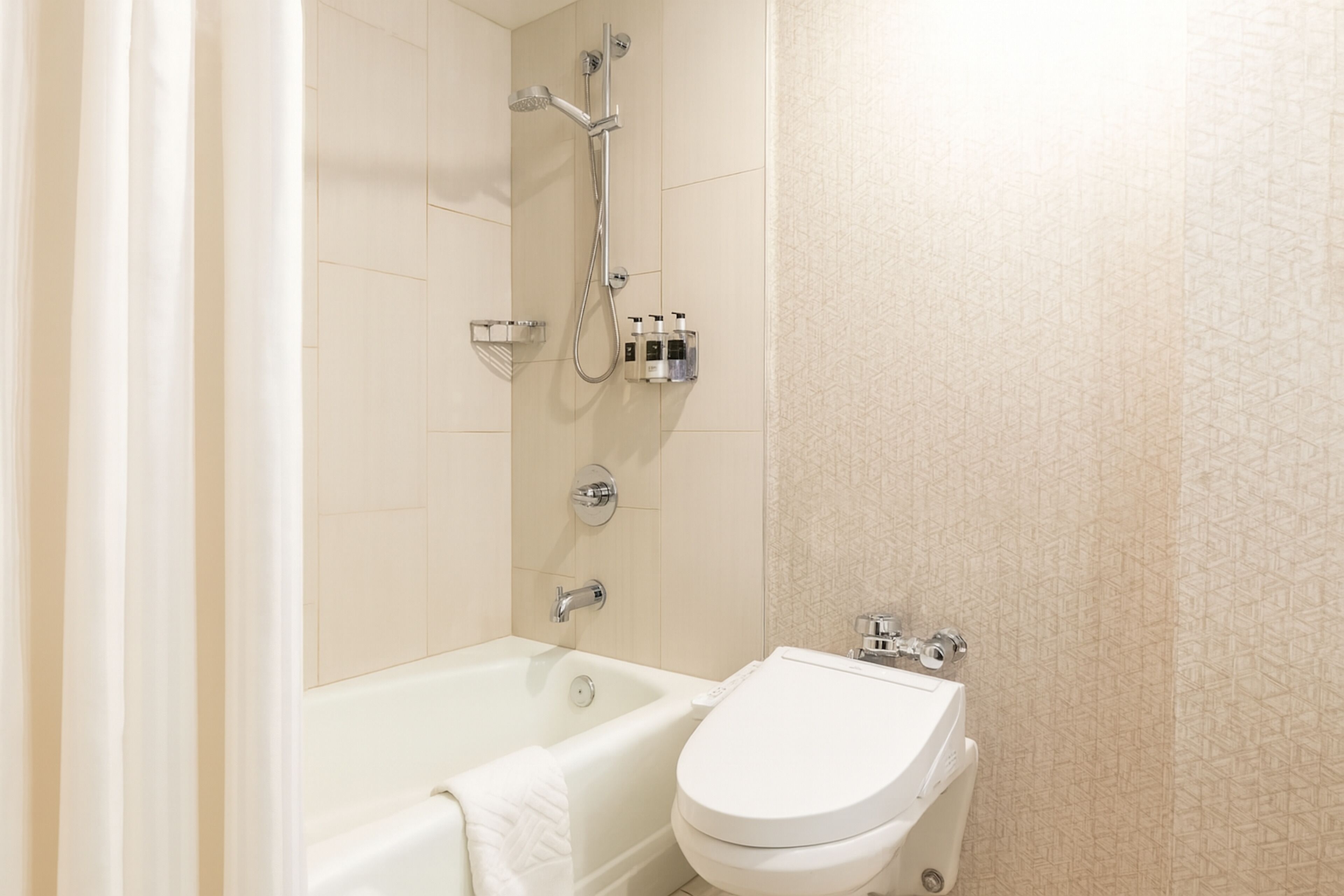 eco-friendly toiletries, hair dryer, towels