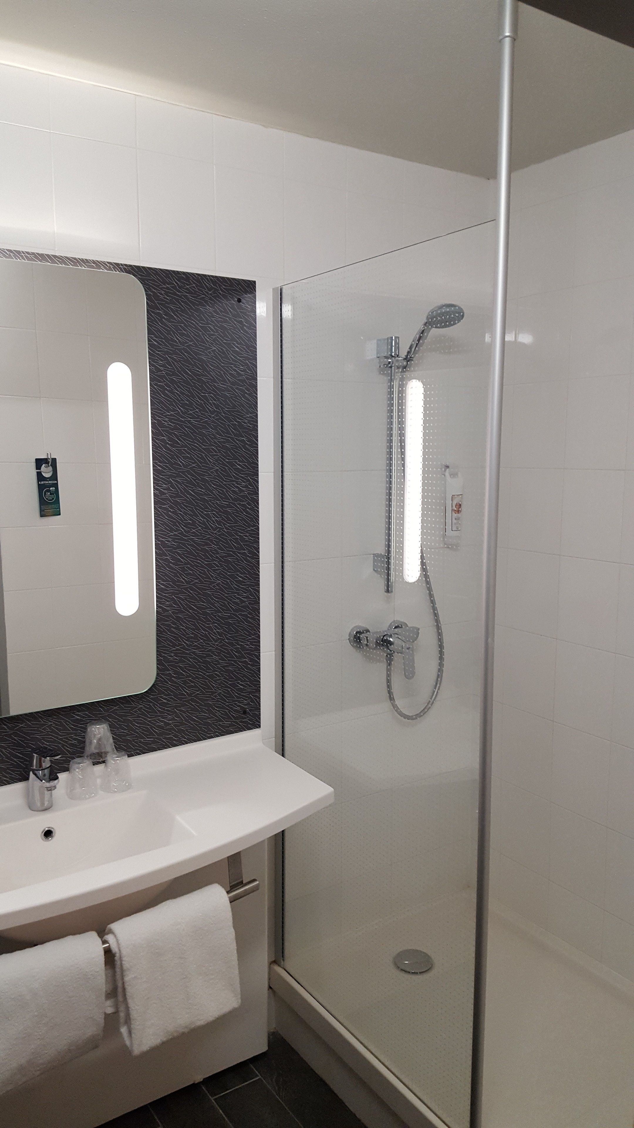 standard room, multiple beds | bathroom | eco-friendly toiletries, hair dryer, towels