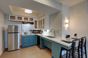 Suite, 1 Queen Bed, Accessible (Mobility Tub One Bedroom) | Private kitchenette | Full-size fridge, microwave, stovetop, dishwasher