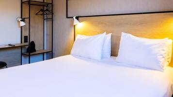 Desk, blackout drapes, soundproofing, iron/ironing board