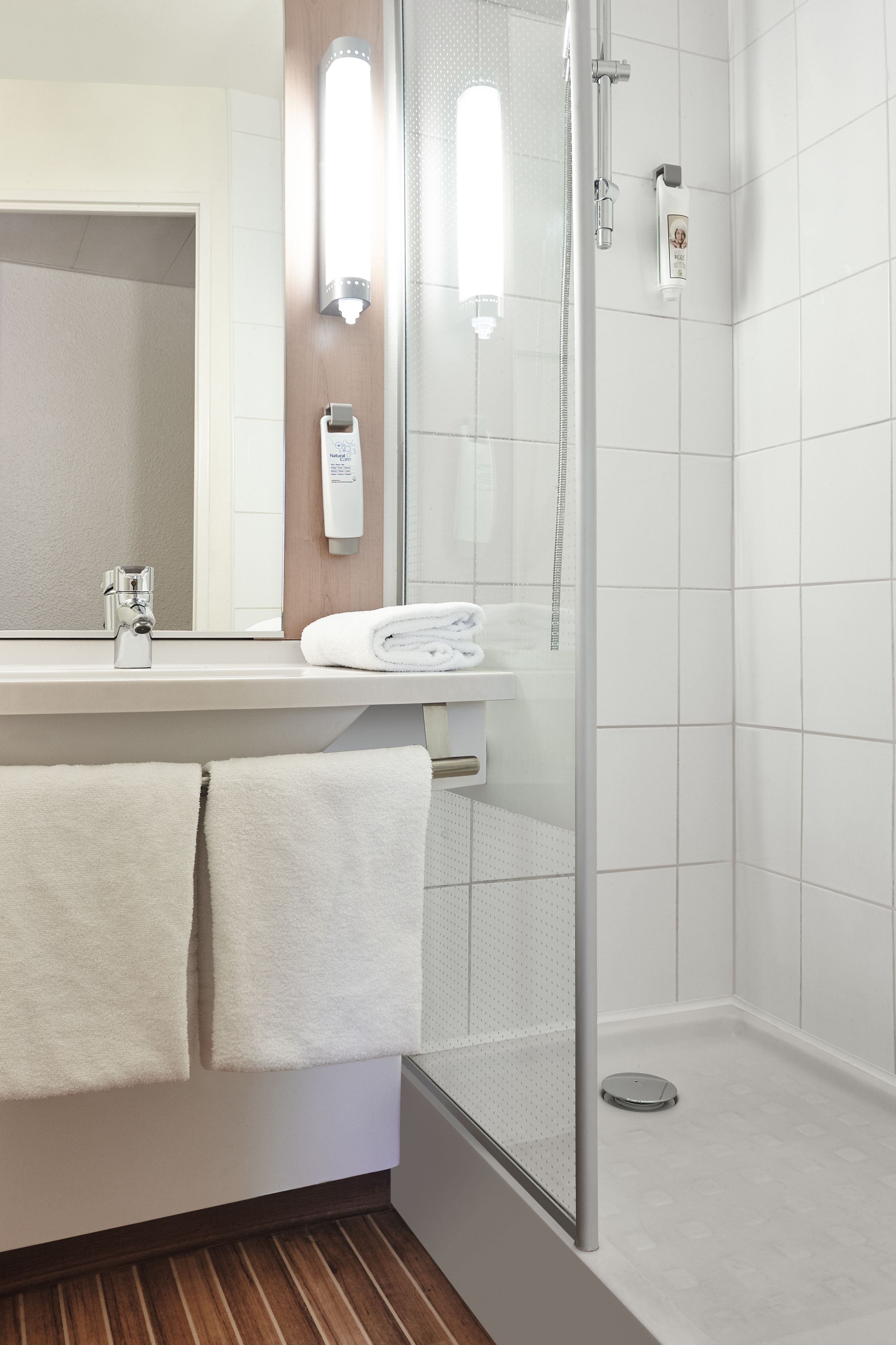 standard room, 2 single beds | bathroom | shower, eco-friendly toiletries, hair dryer, towels