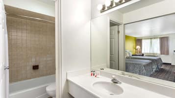 Room, 1 King Bed, Non Smoking | Bathroom | Bathtub, deep soaking tub, free toiletries, towels