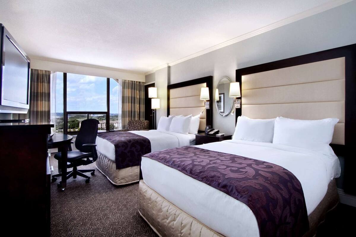 Premium bedding, down comforters, pillowtop beds, in-room safe