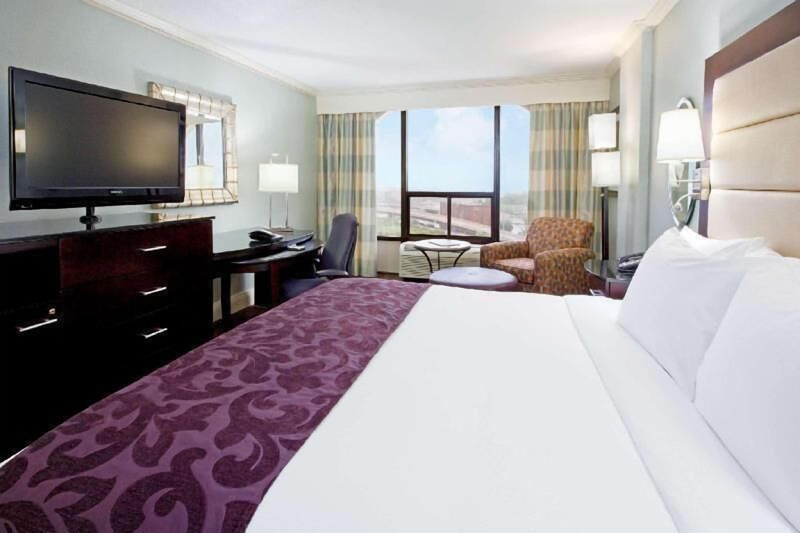 Premium bedding, down comforters, pillowtop beds, in-room safe