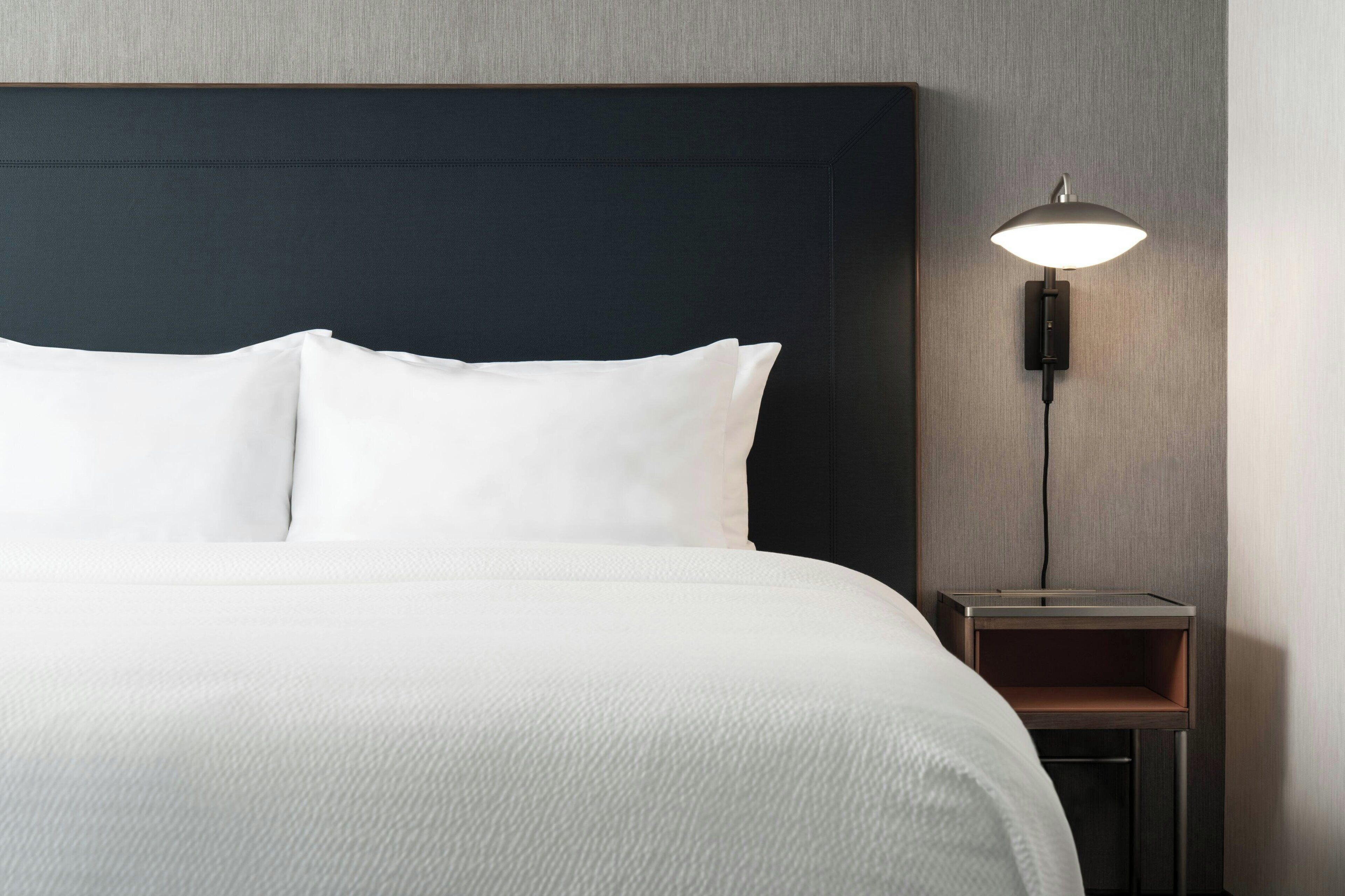 deluxe room, 1 king bed with sofa bed, non smoking | premium bedding, memory-foam beds, in-room safe, desk