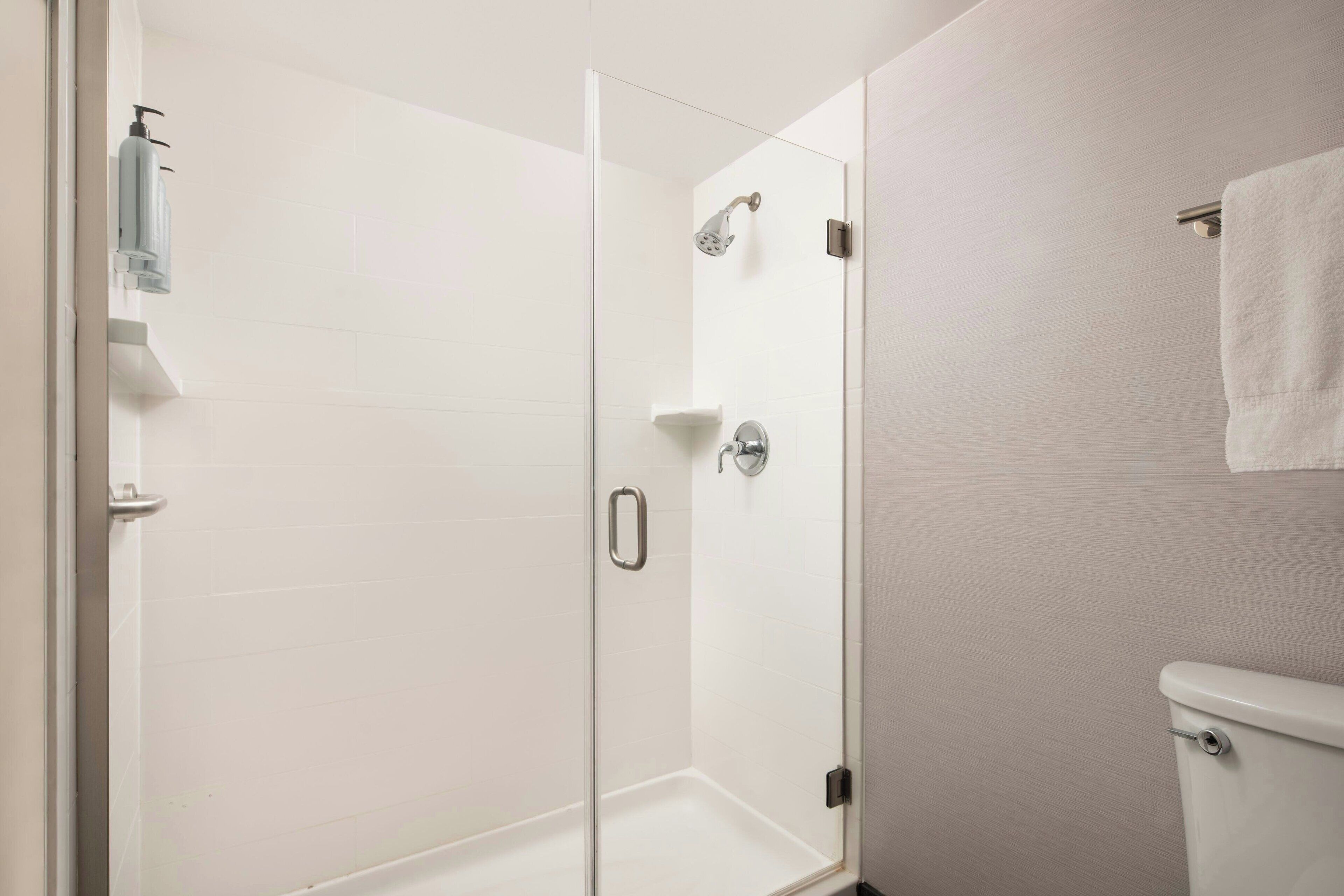 eco-friendly toiletries, hair dryer, towels