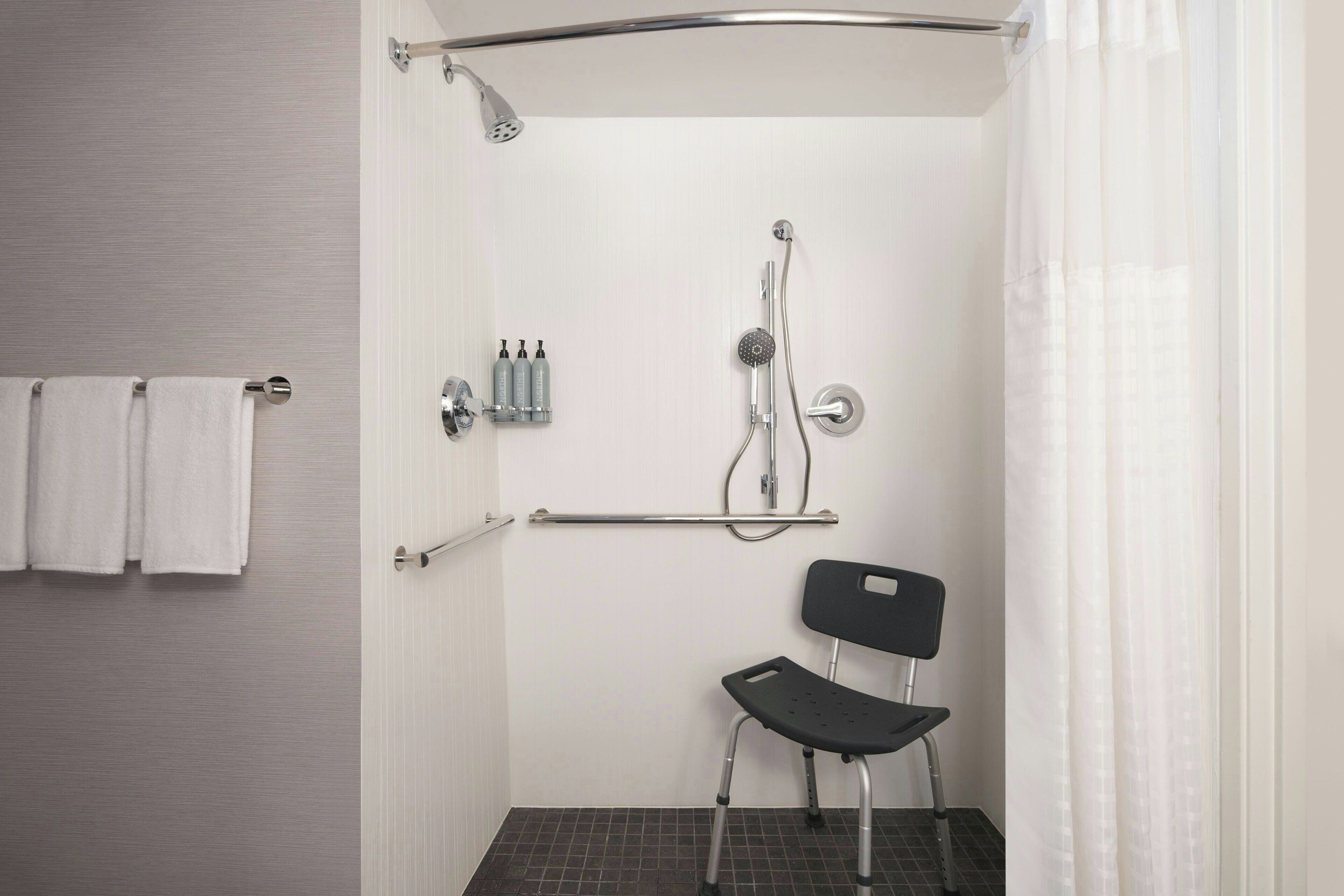 deluxe room, 2 queen beds, non smoking | bathroom | eco-friendly toiletries, hair dryer, towels