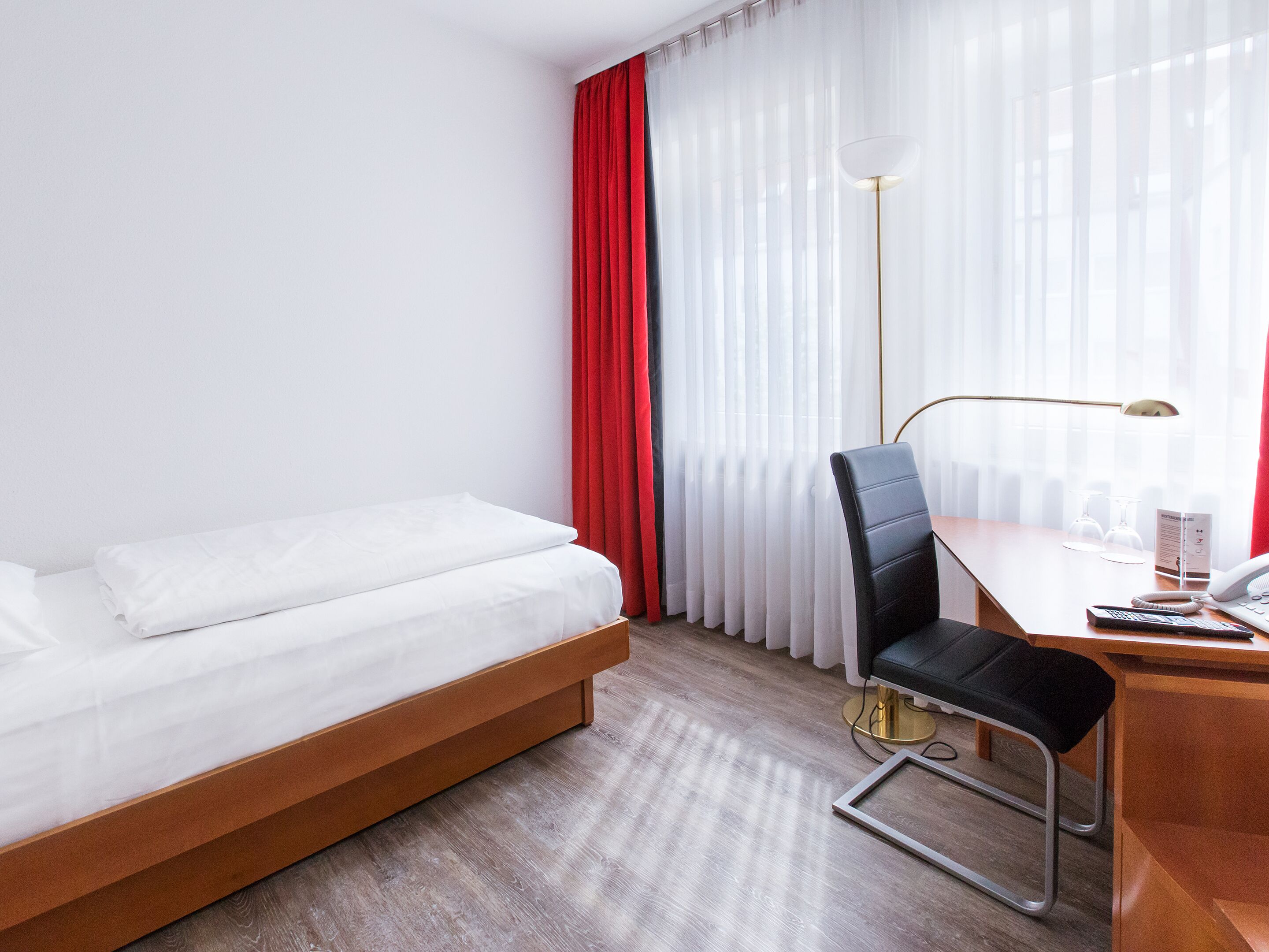 standard double or twin room | free minibar items, in-room safe, desk, blackout curtains