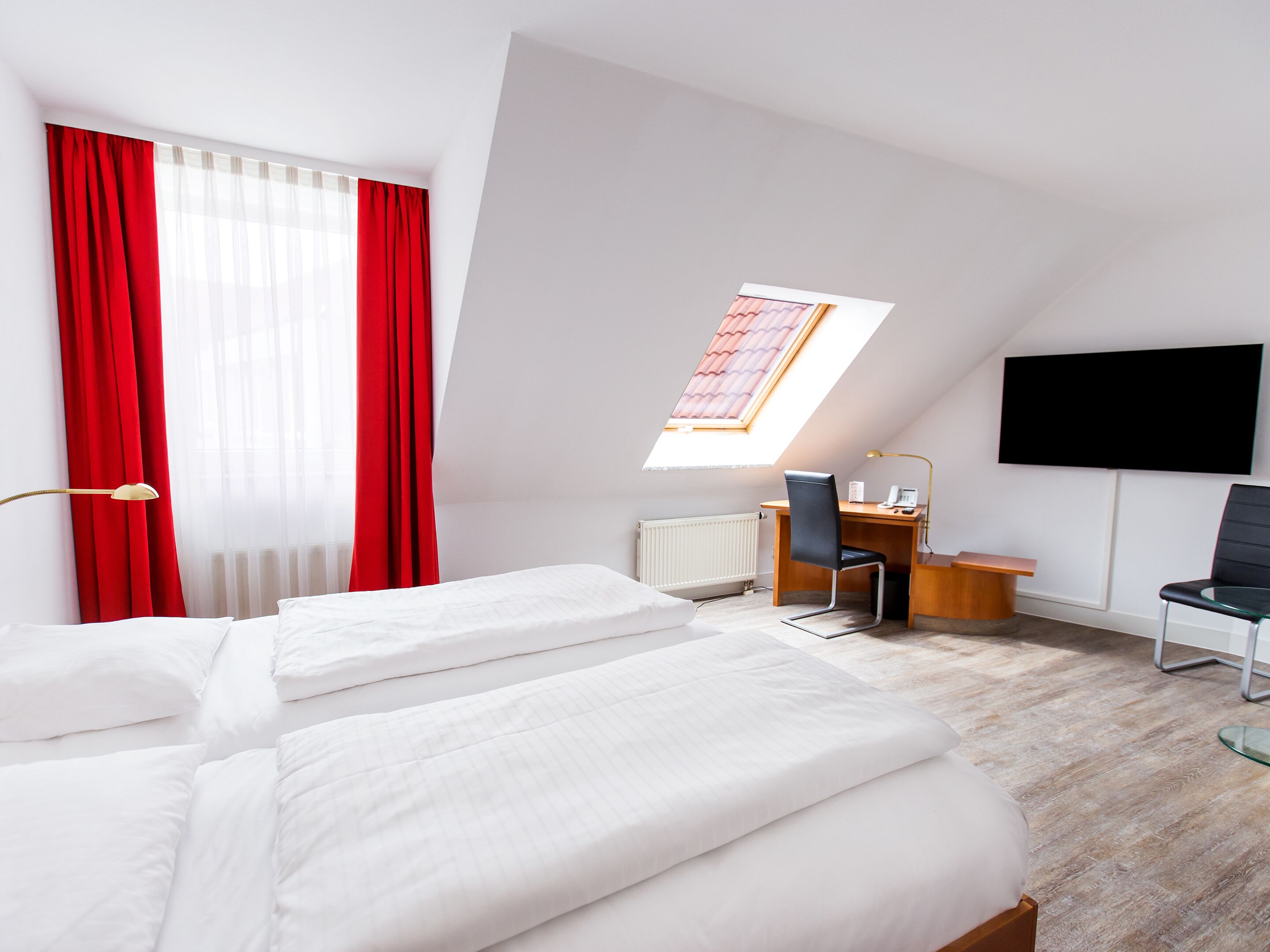 standard double or twin room | free minibar items, in-room safe, desk, blackout curtains