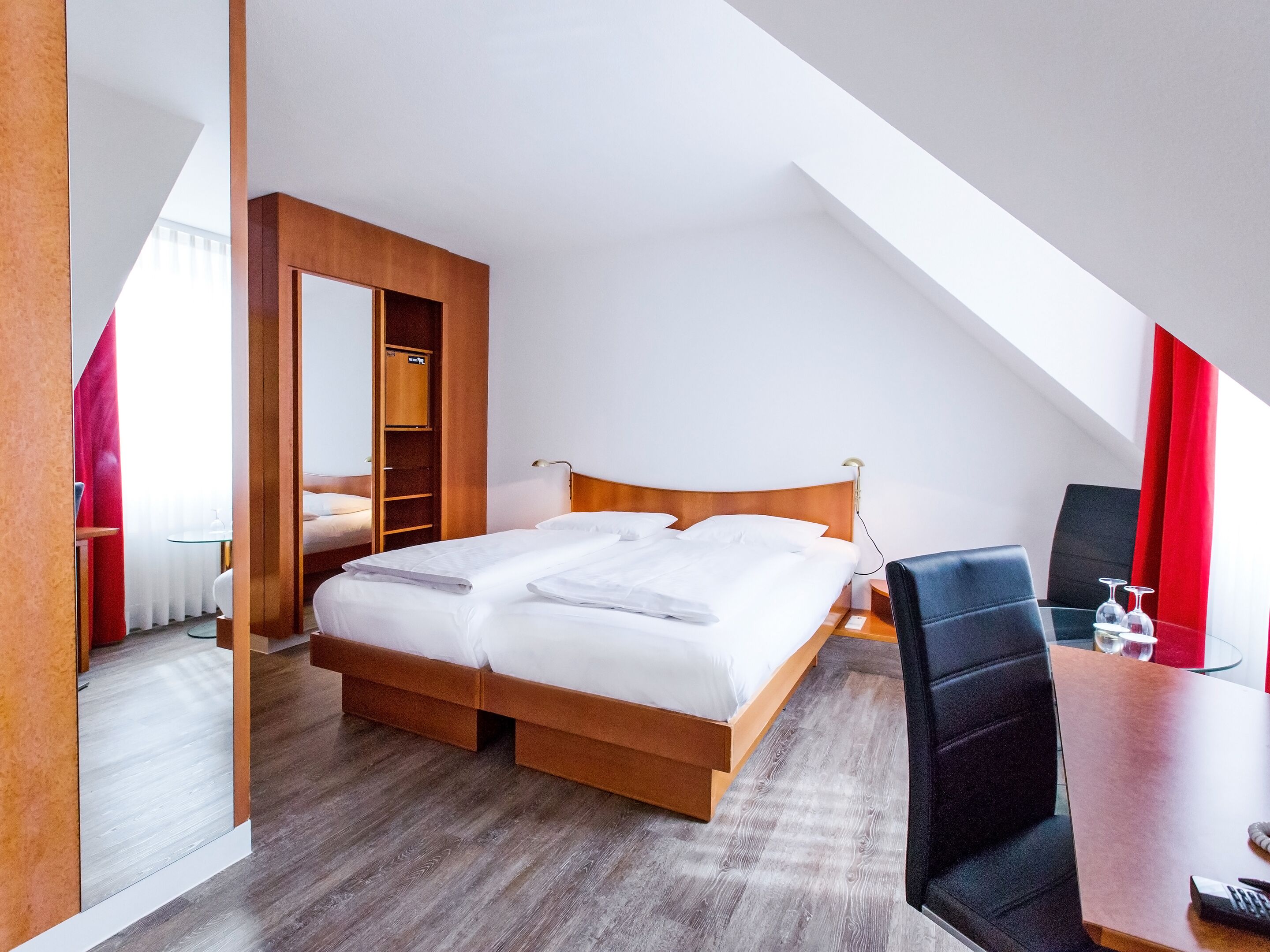 standard double or twin room | free minibar items, in-room safe, desk, blackout curtains