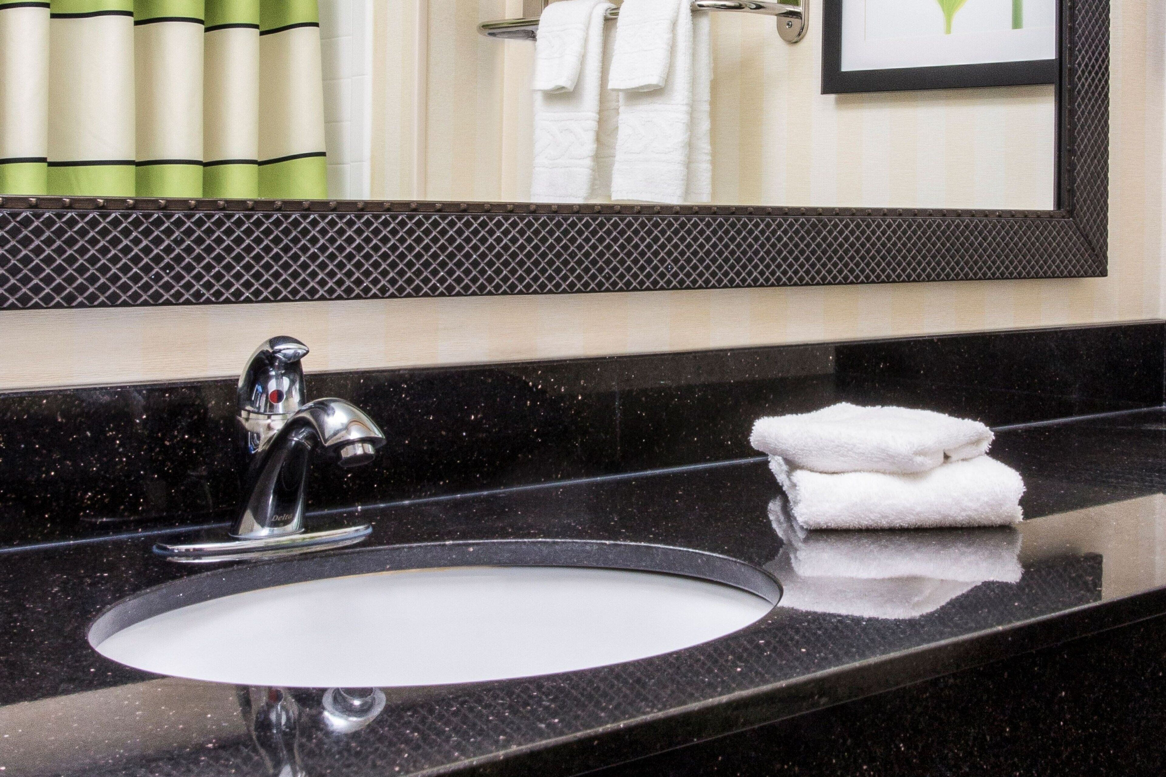 separate bathtub and shower, eco-friendly toiletries, hair dryer, towels