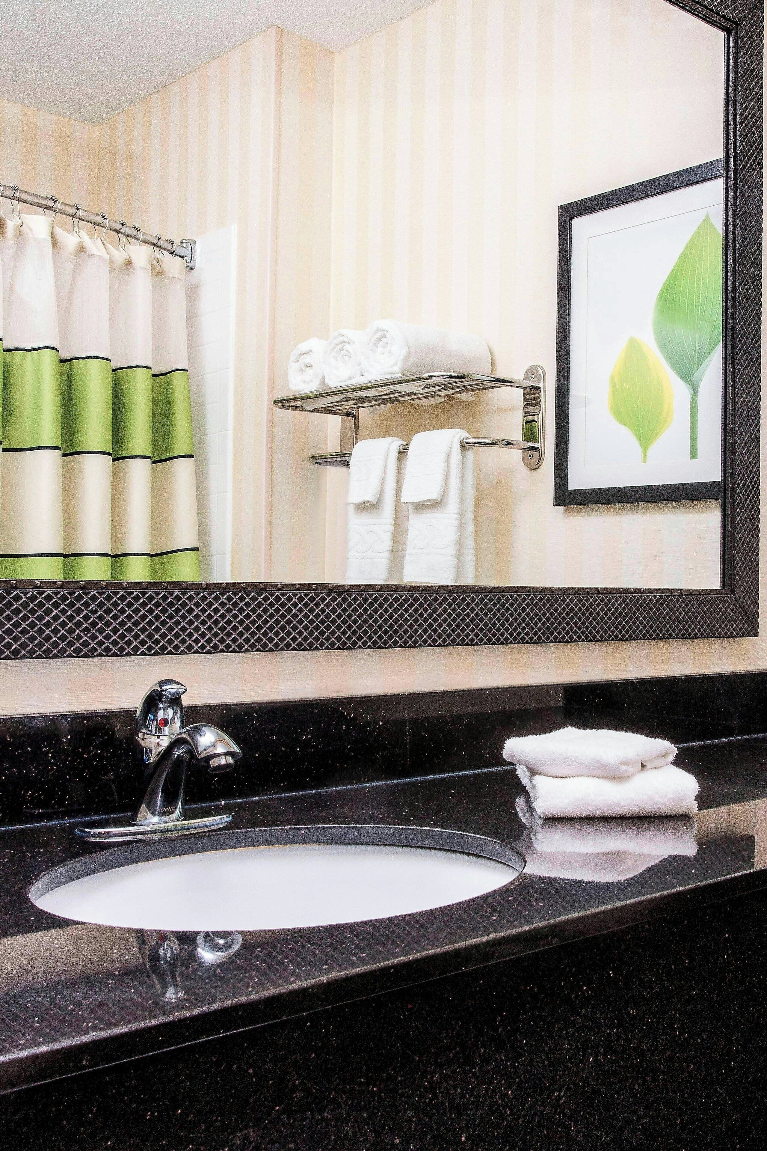separate bathtub and shower, eco-friendly toiletries, hair dryer, towels