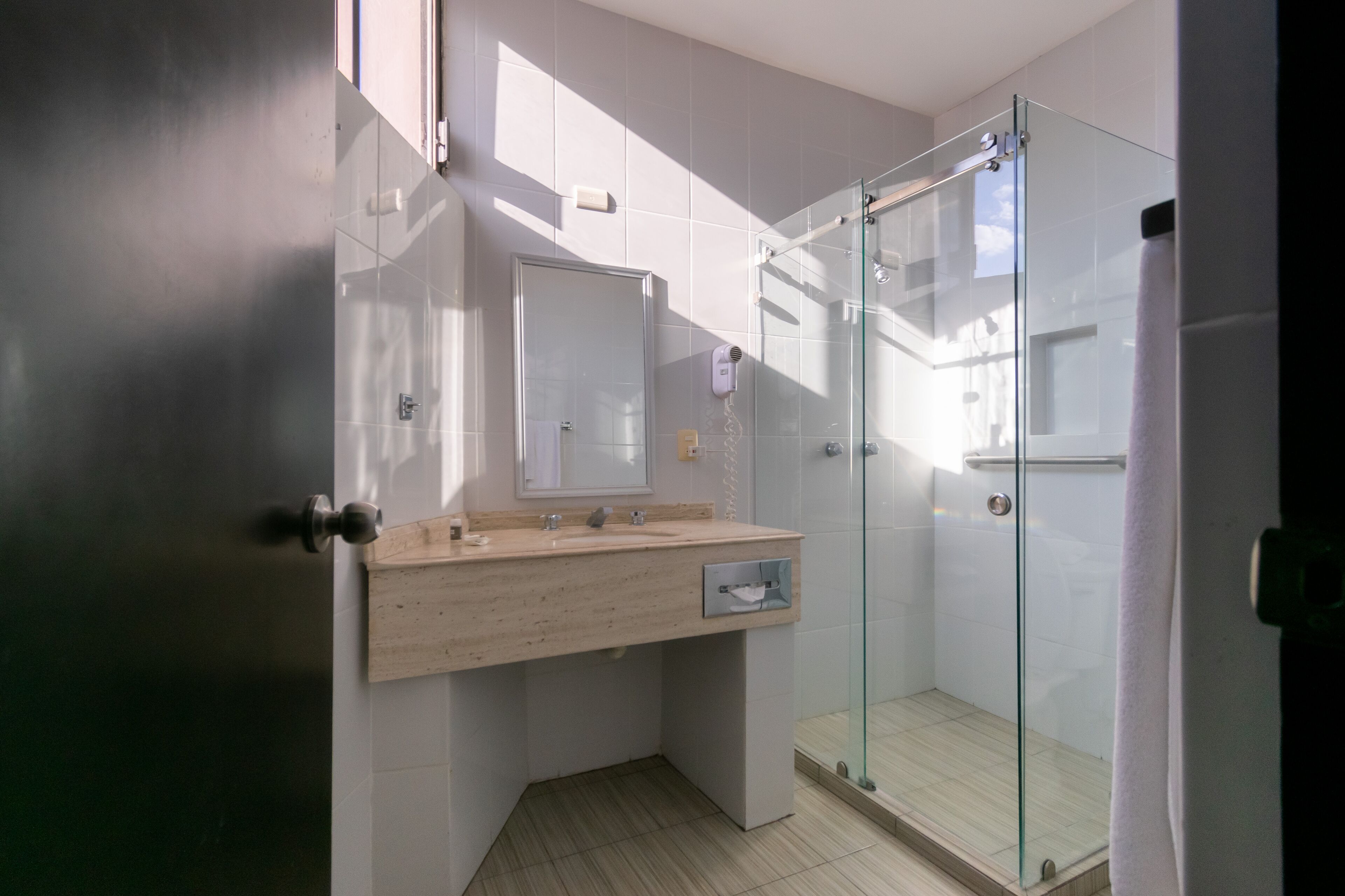 shower, eco-friendly toiletries, hair dryer, towels