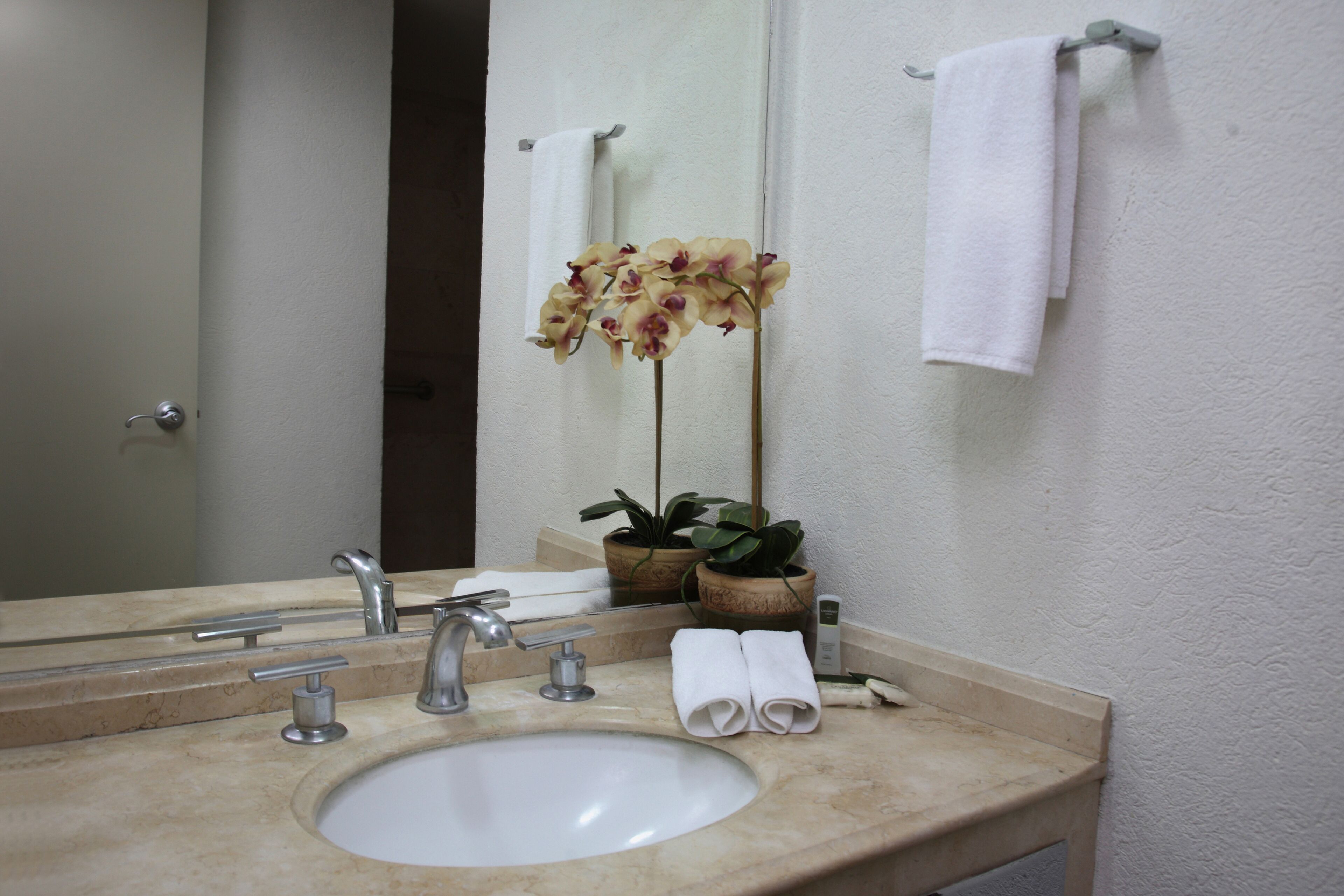 shower, eco-friendly toiletries, hair dryer, towels