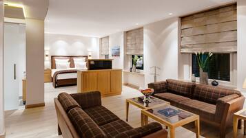 Suite (Alpine) | Living area | 50-inch flat-screen TV with cable channels